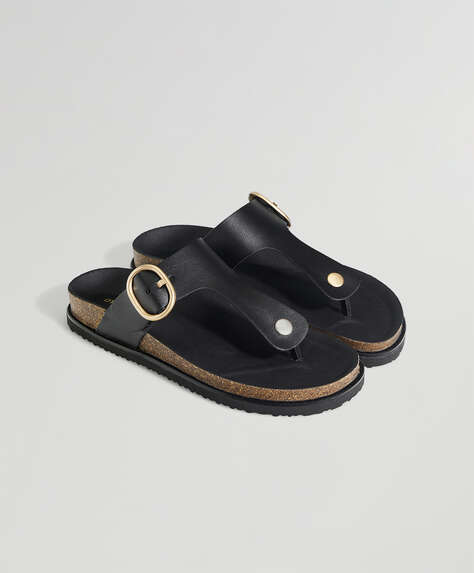 Black buckle thong sandals