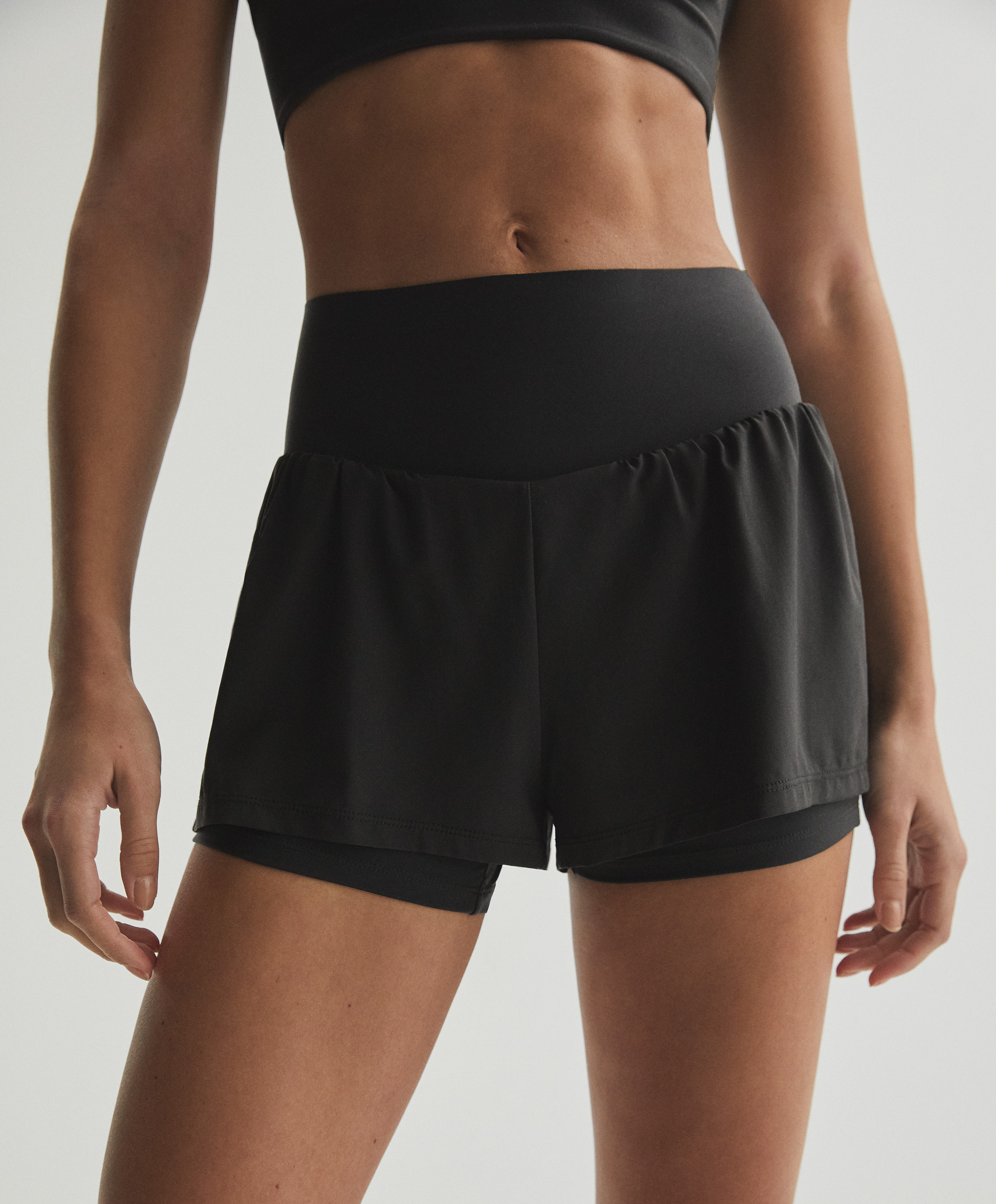 Shorts compressive pocket - Oysho fabrics | OYSHO México