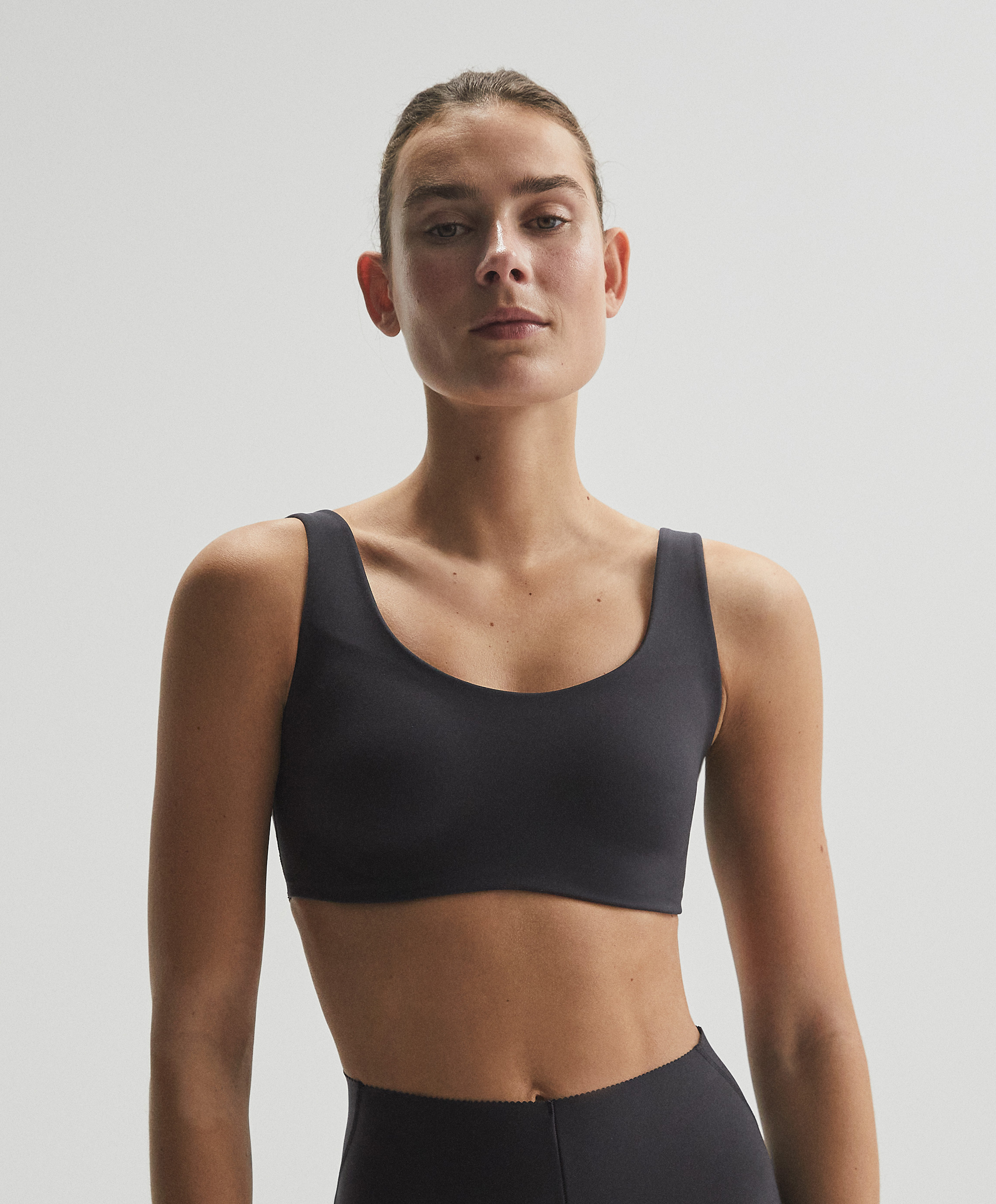 Compressive sports bra with laser-cut back