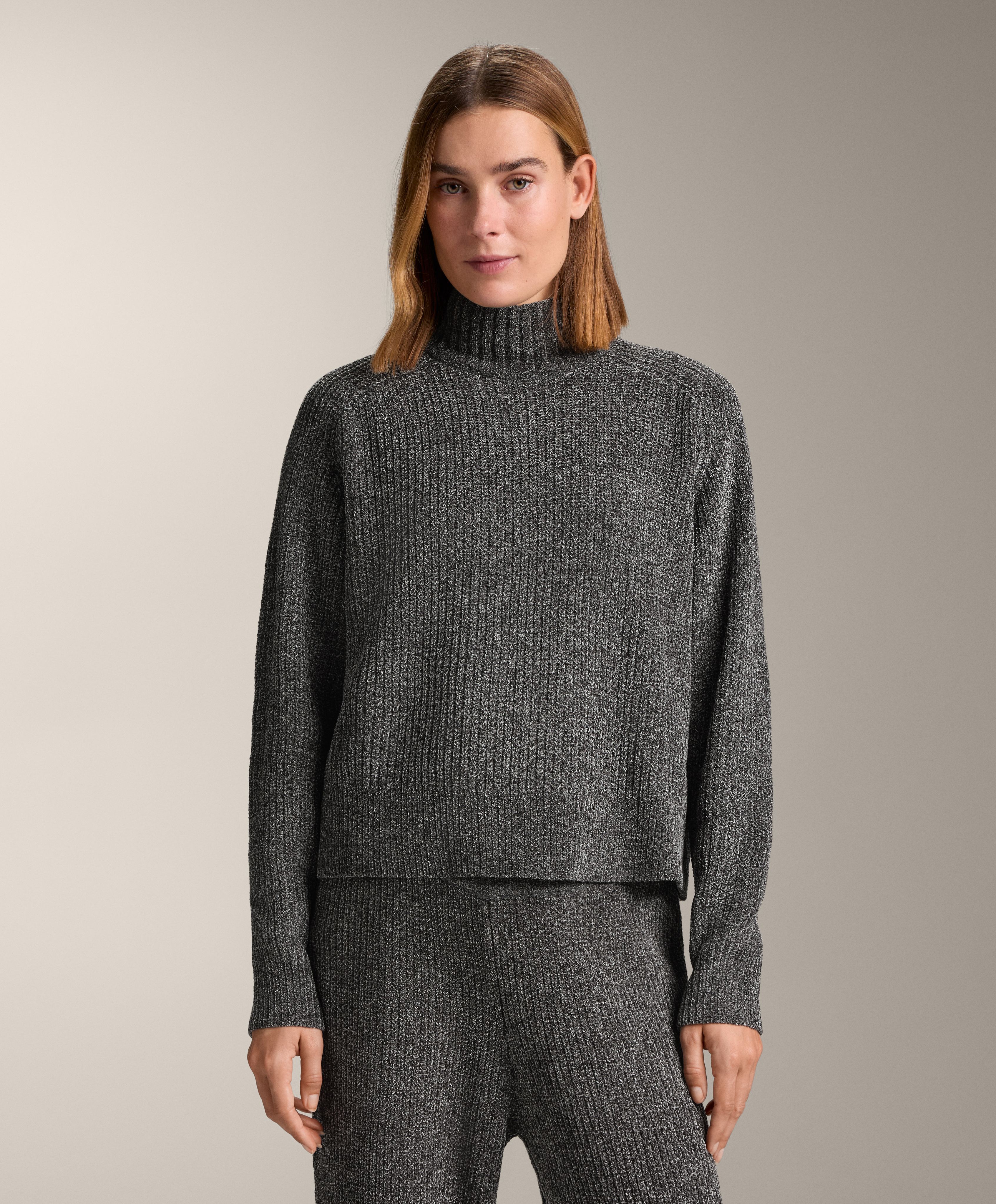 High neck cable knit jumper