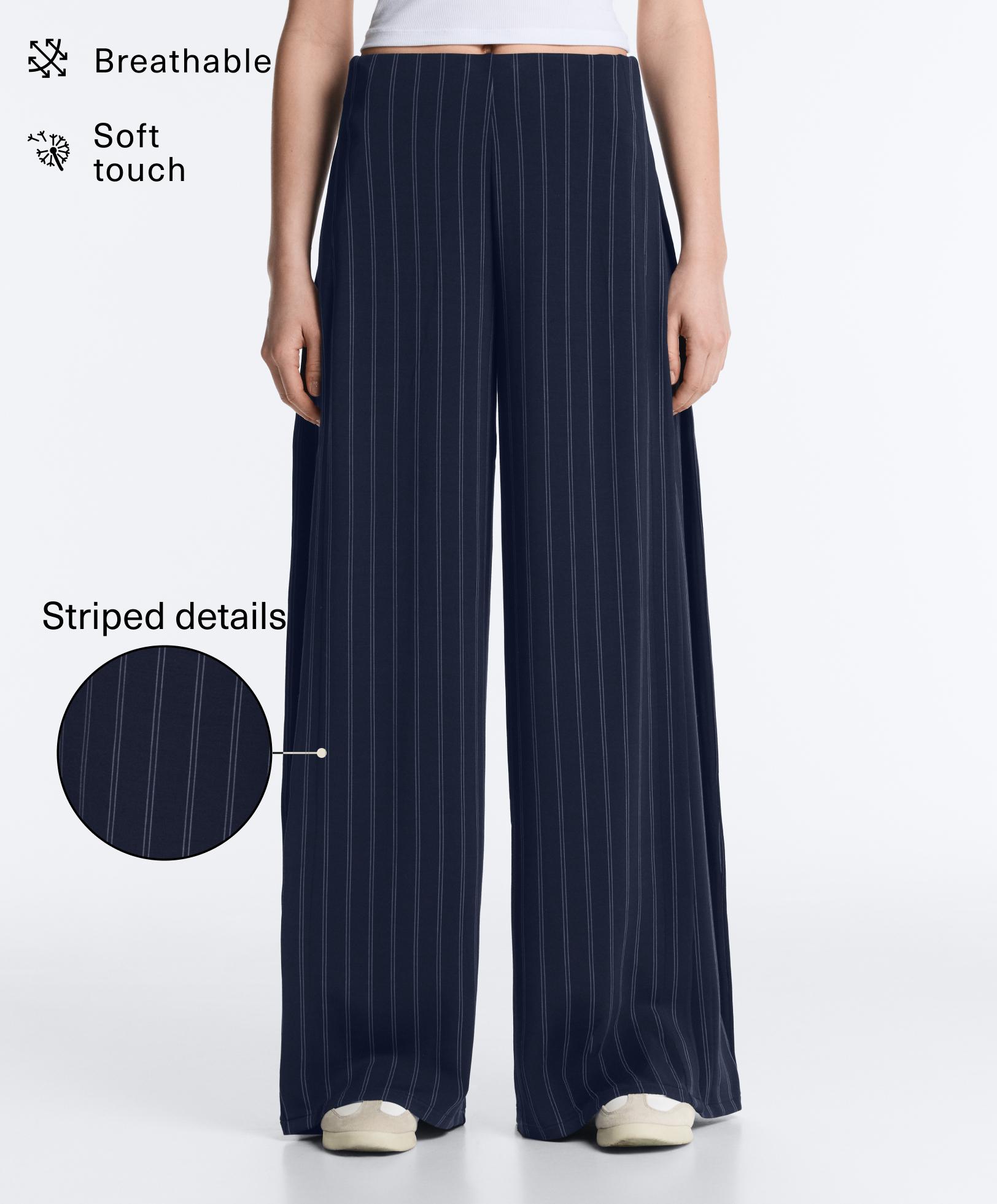 Pantalón ancho pliegue lateral con modal tacto suave