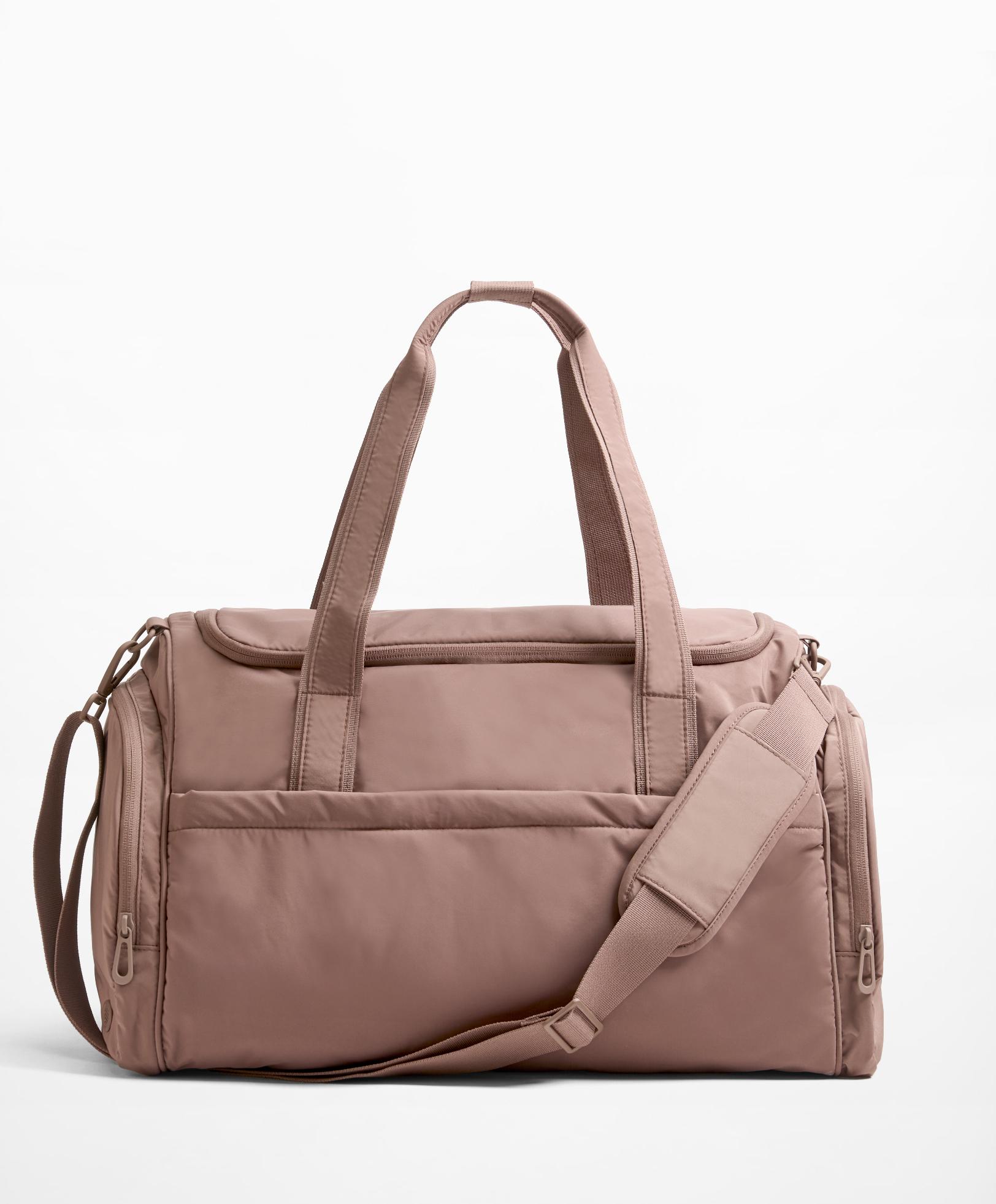 Technical bag with side pockets