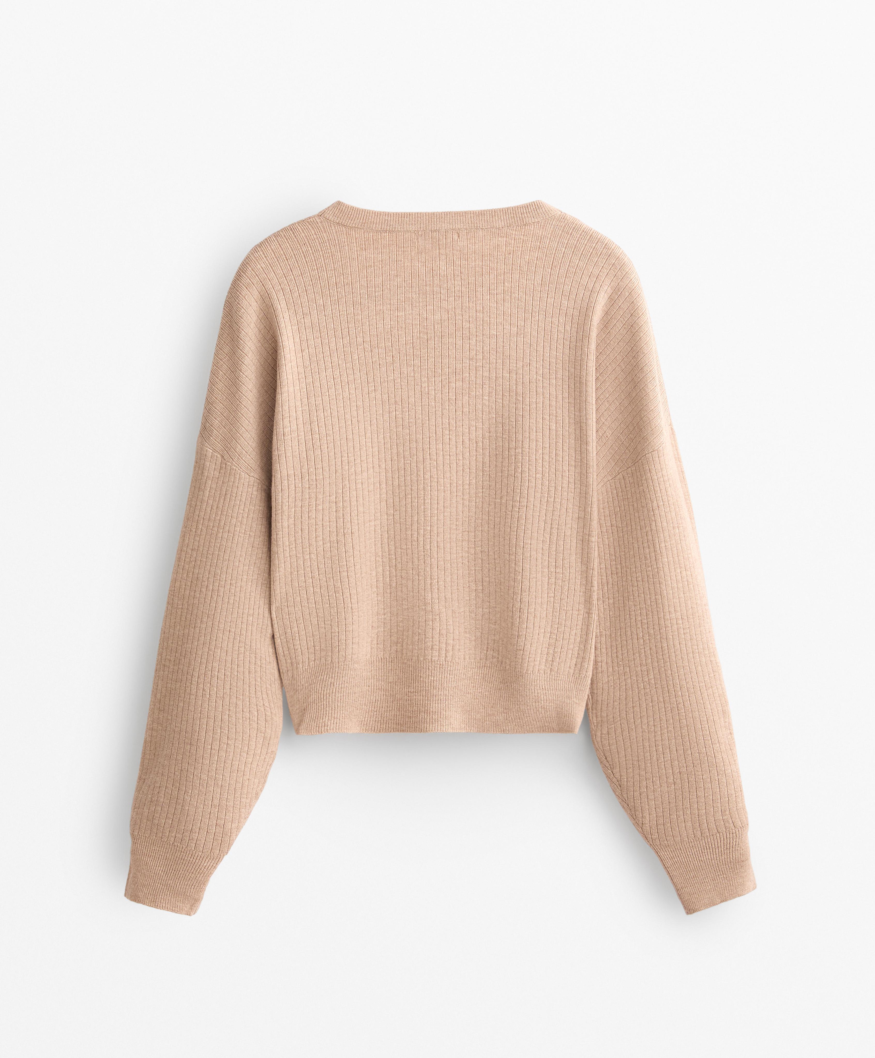 Pullover cropped incrociato in maglia