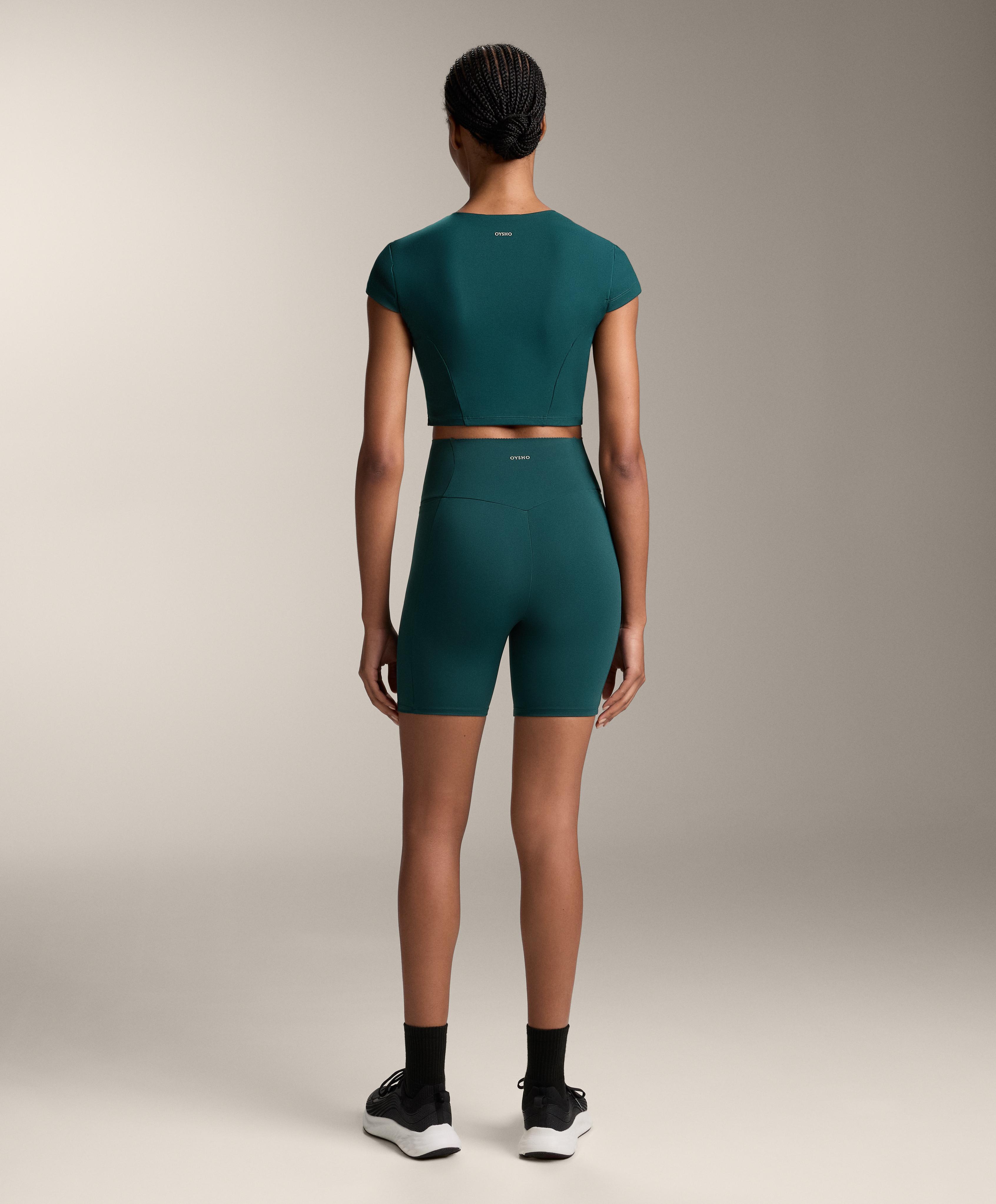 Total look compressive pocket biker verde - Rebajas