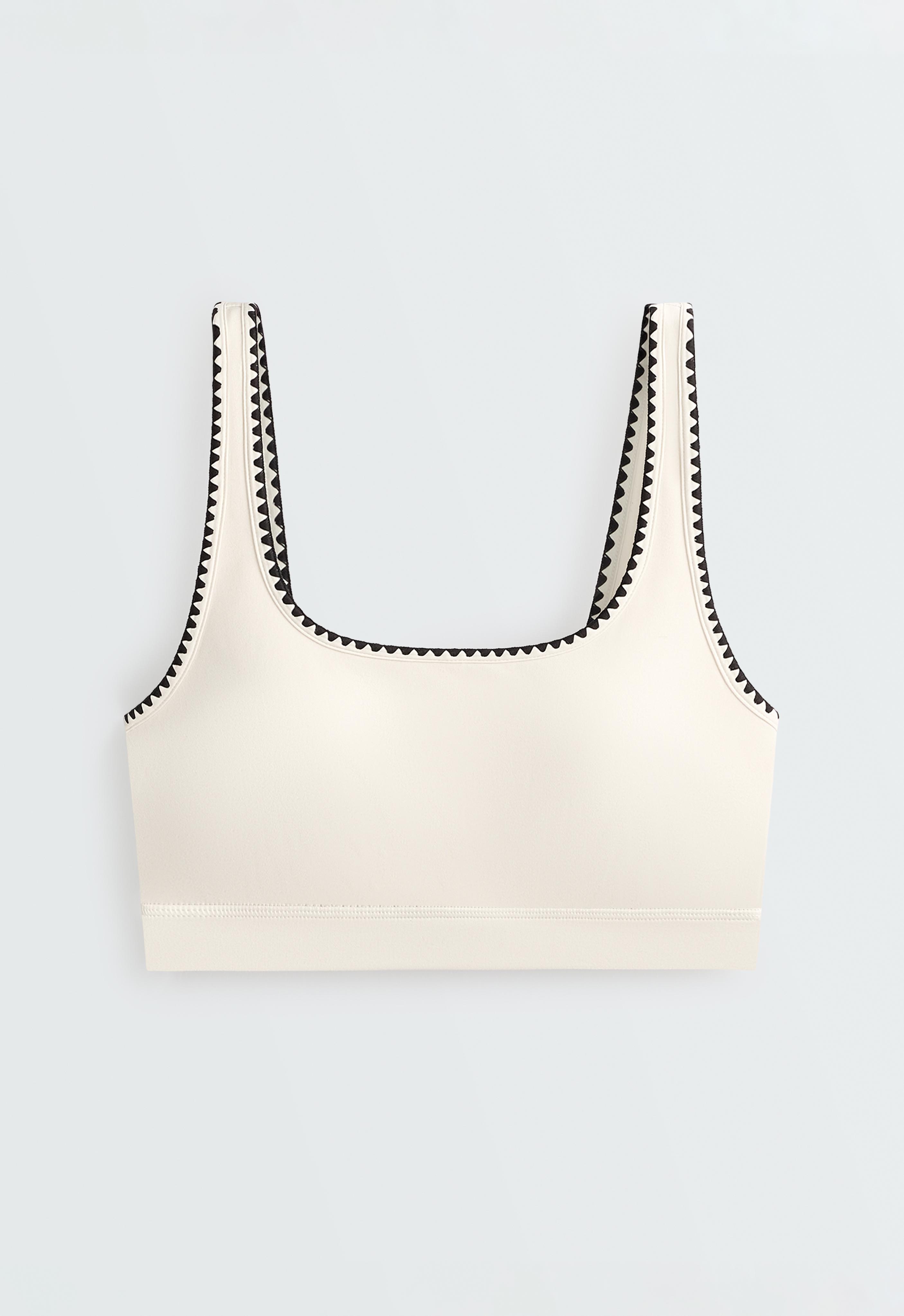 Medium-support Comfortlux sports bra with contrast seams — PALE ECRU