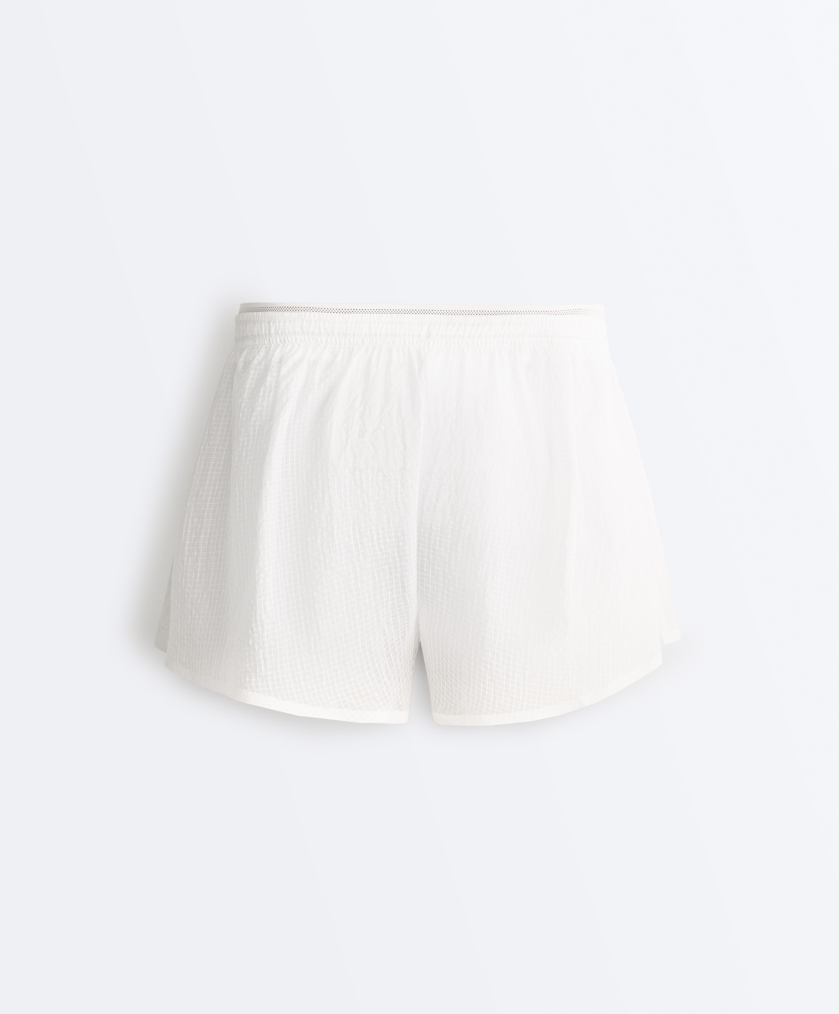 Technical 2-in-1 checked mid-rise shorts — WHITE