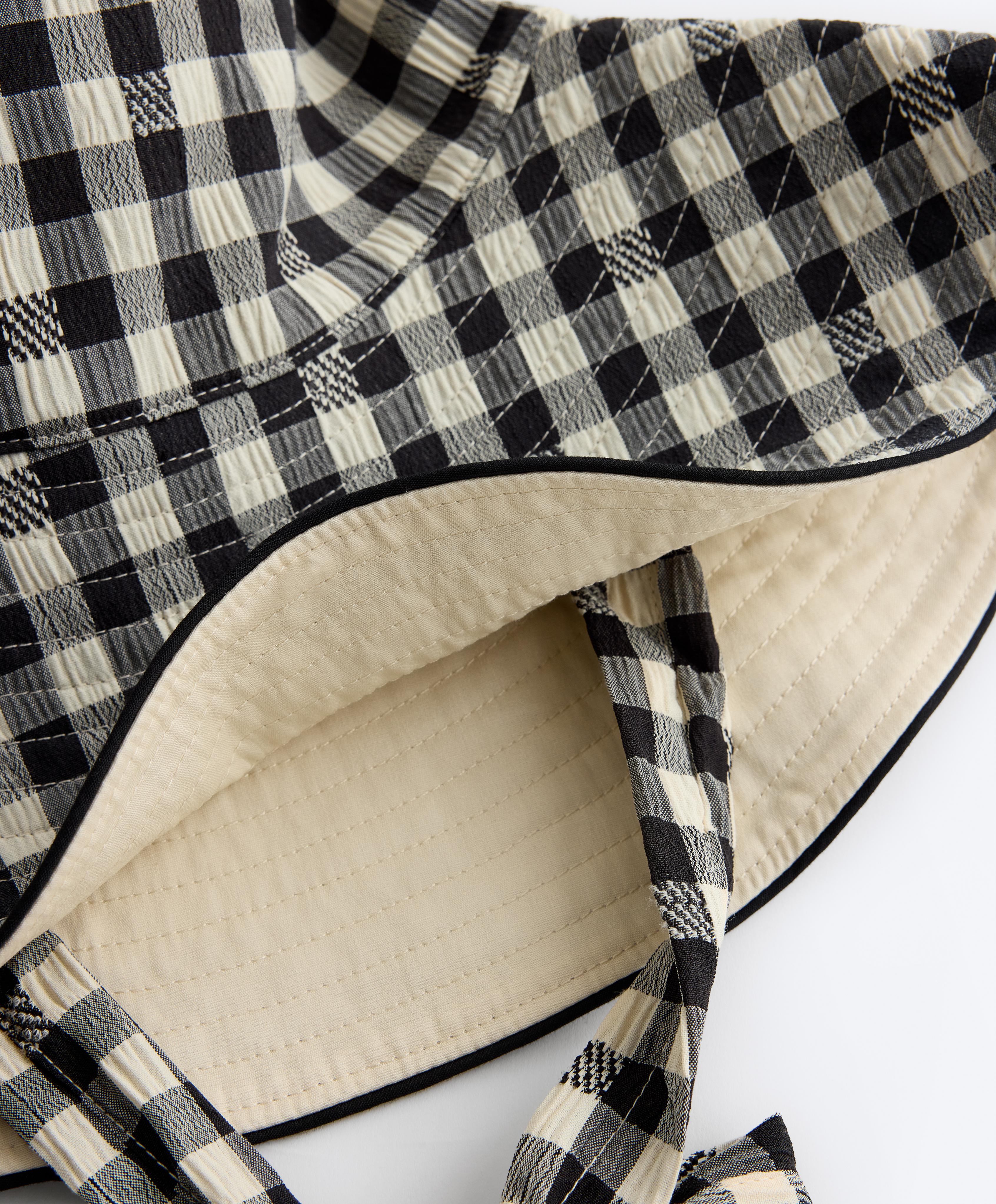 Reversible check bucket hat — BLACK
