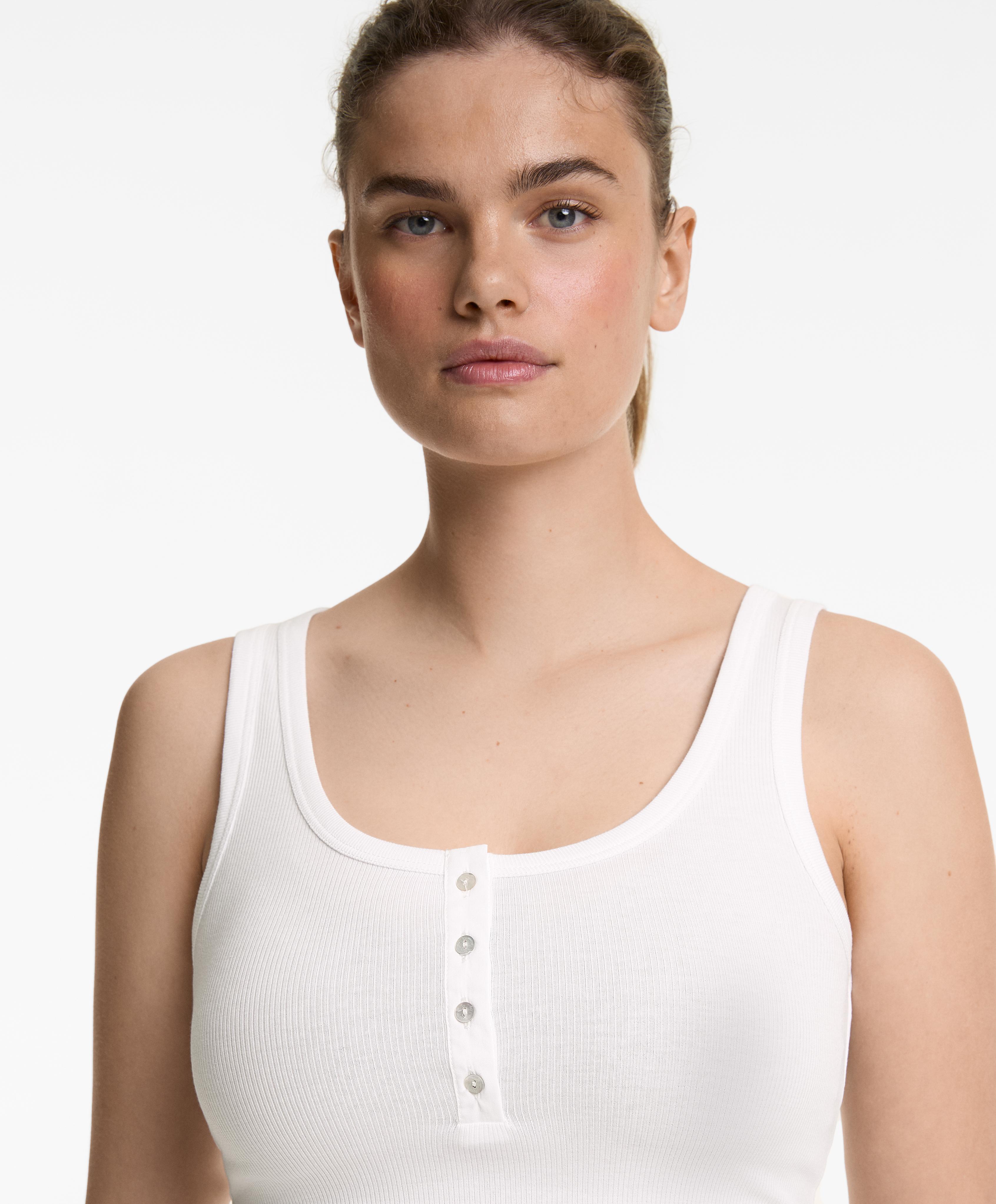 Sleeveless buttoned top with cotton and modal Sleeveless buttoned top with cotton and modal