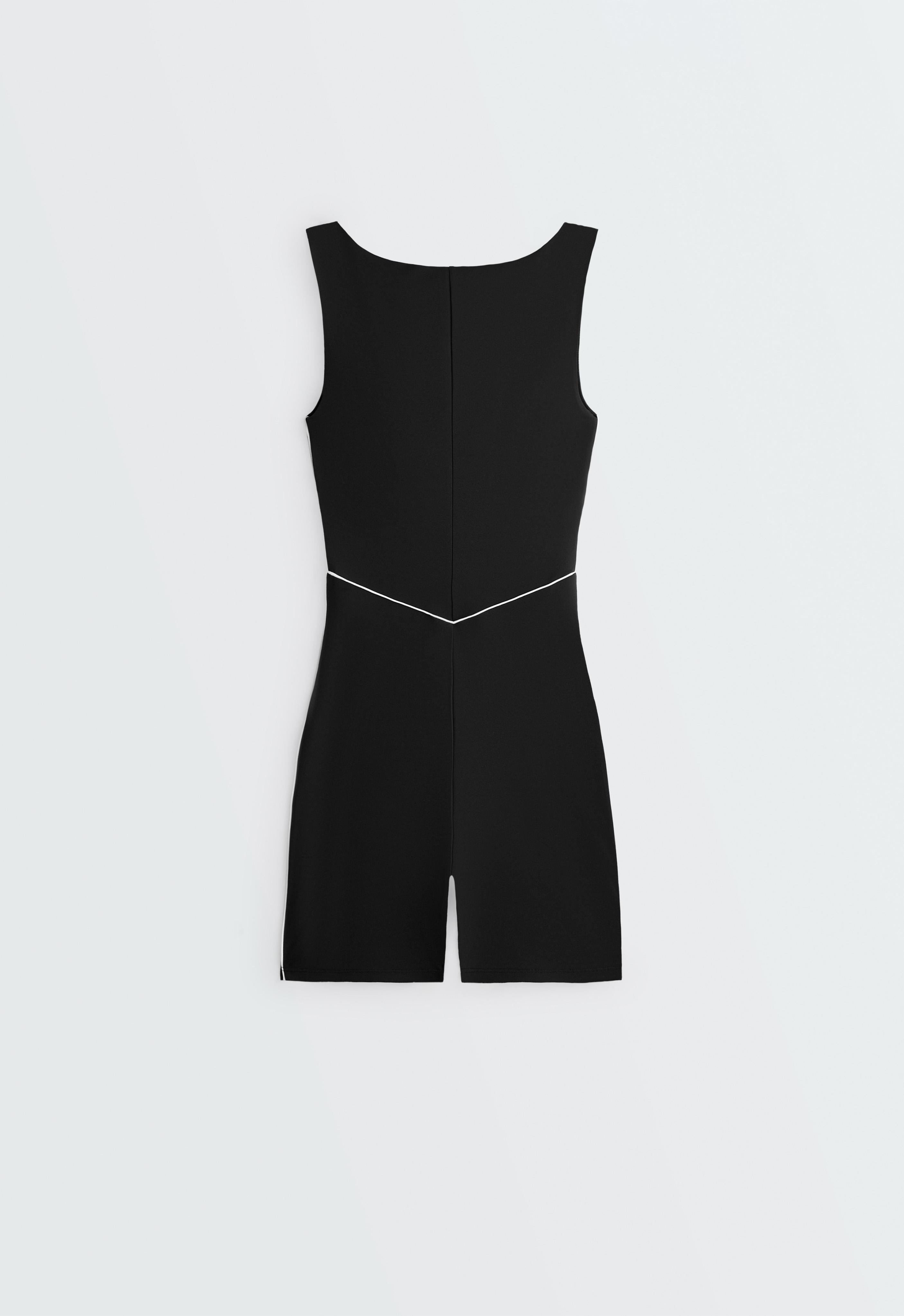 Comfortlux piping short jumpsuit — BLACK