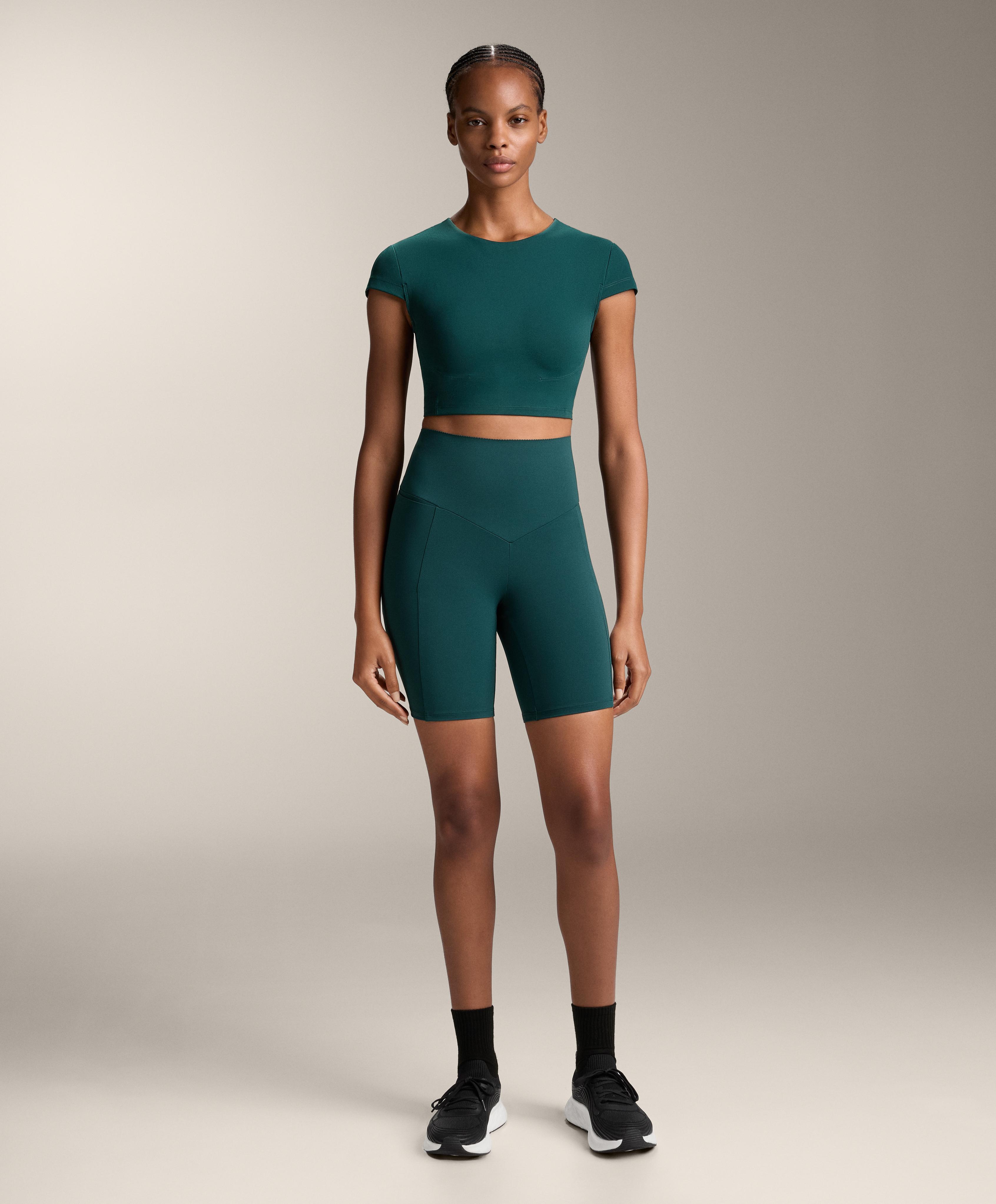 Total look compressive pocket biker verde - Rebajas