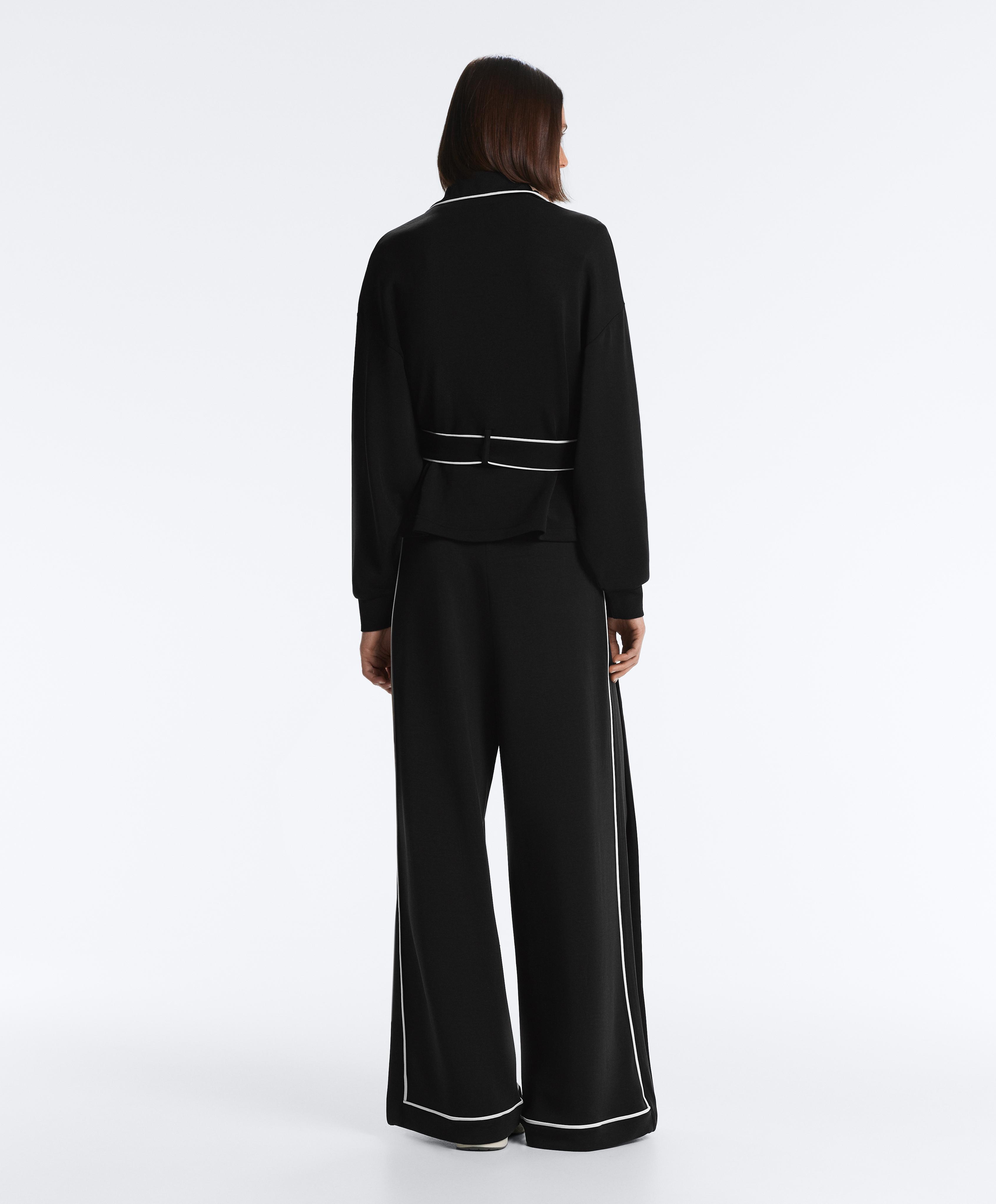 Soft-touch modal wide-leg trousers with contrast piping — BLACK