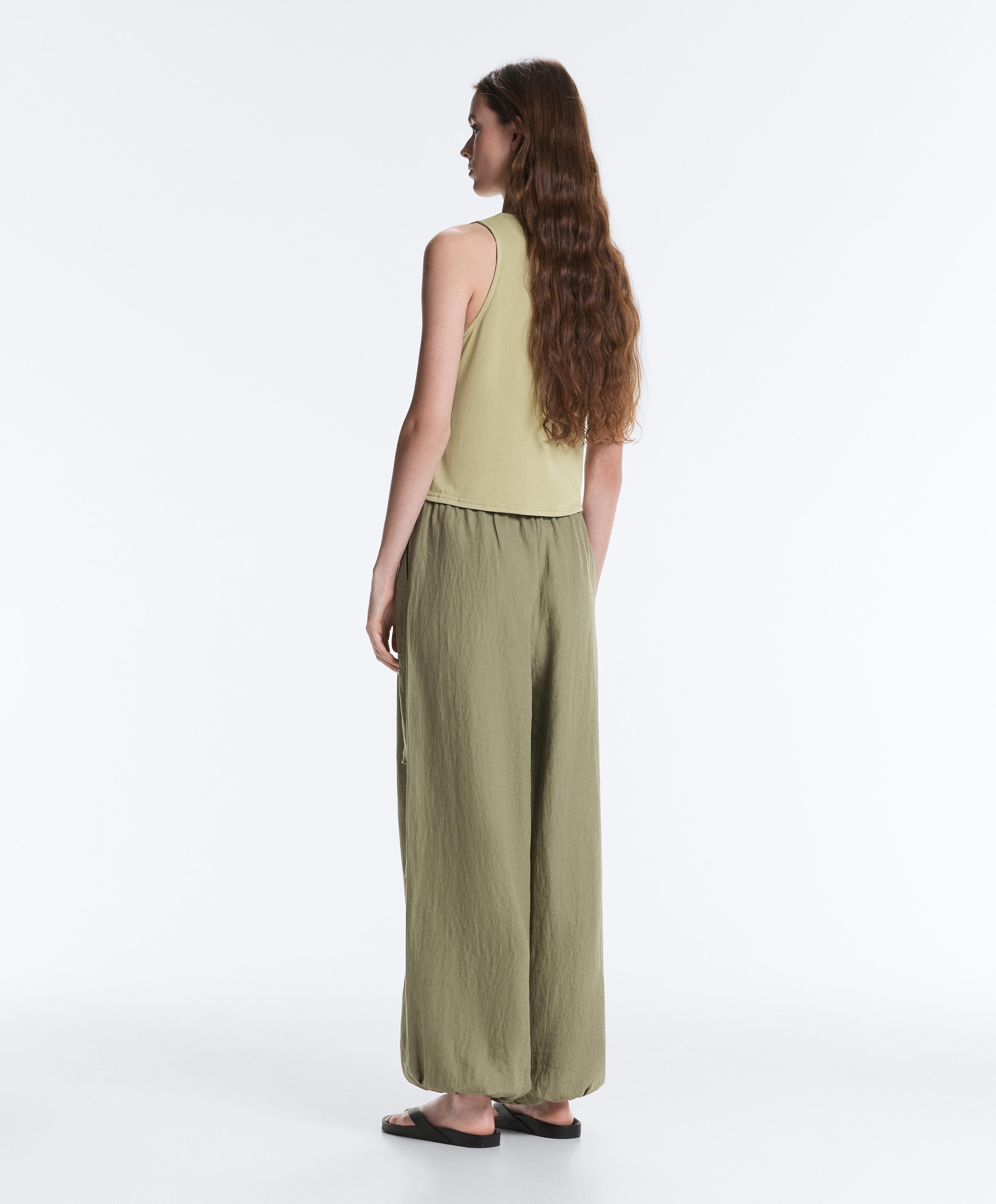Modal blend sleeveless crossover T-shirt — PALE PISTACHIO