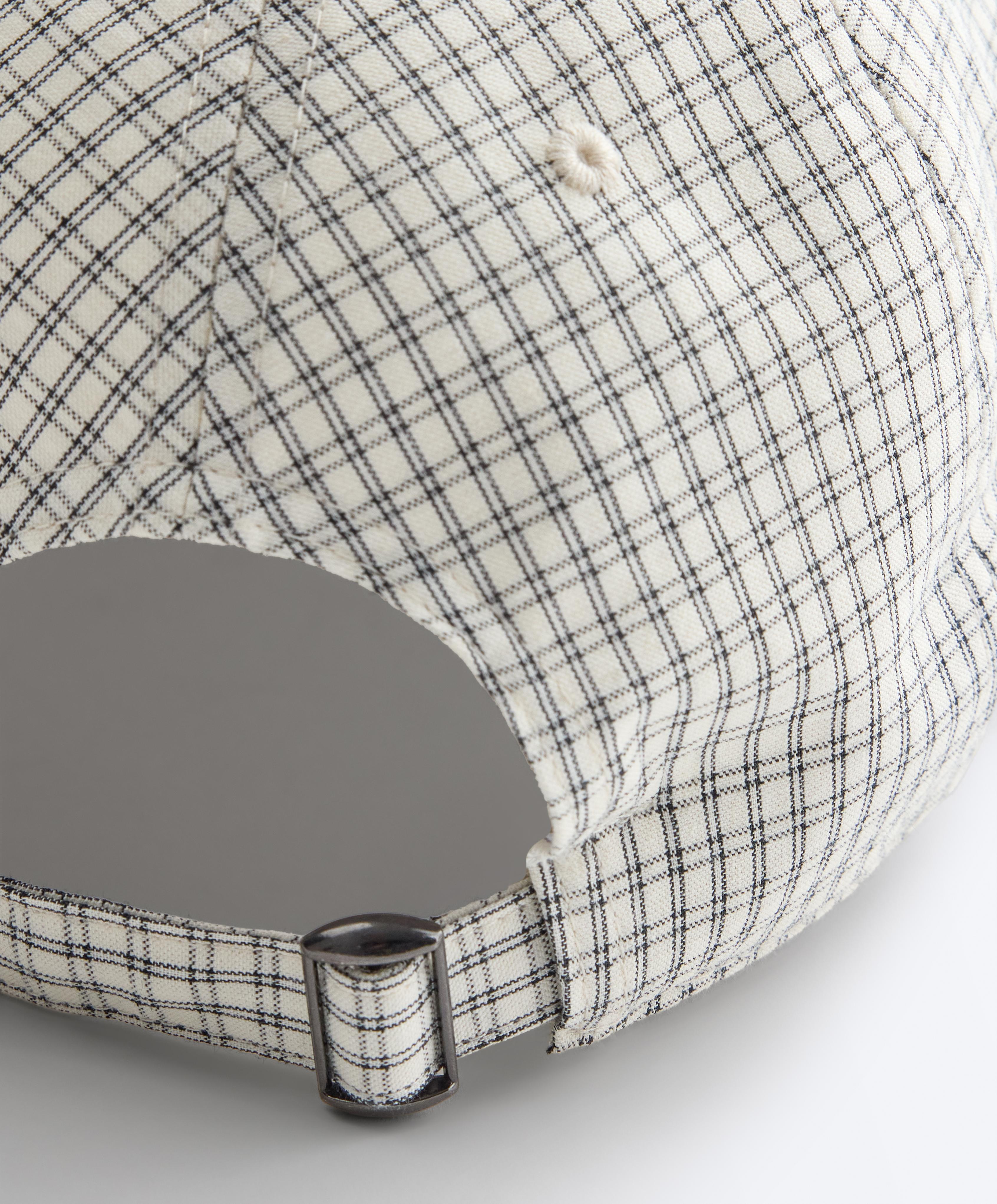 Check print cap — ECRU
