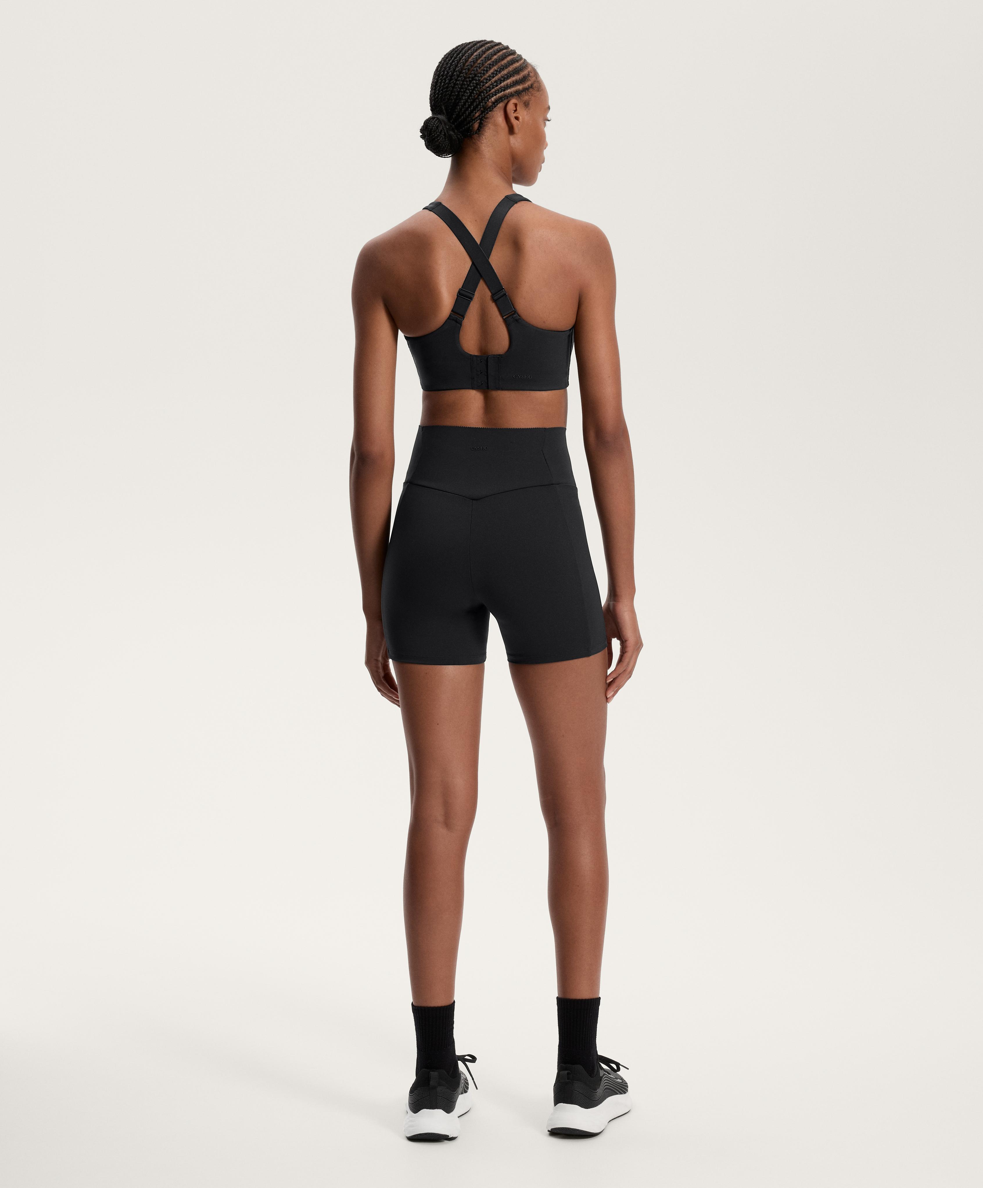 Black compressive hot pant pocket total look