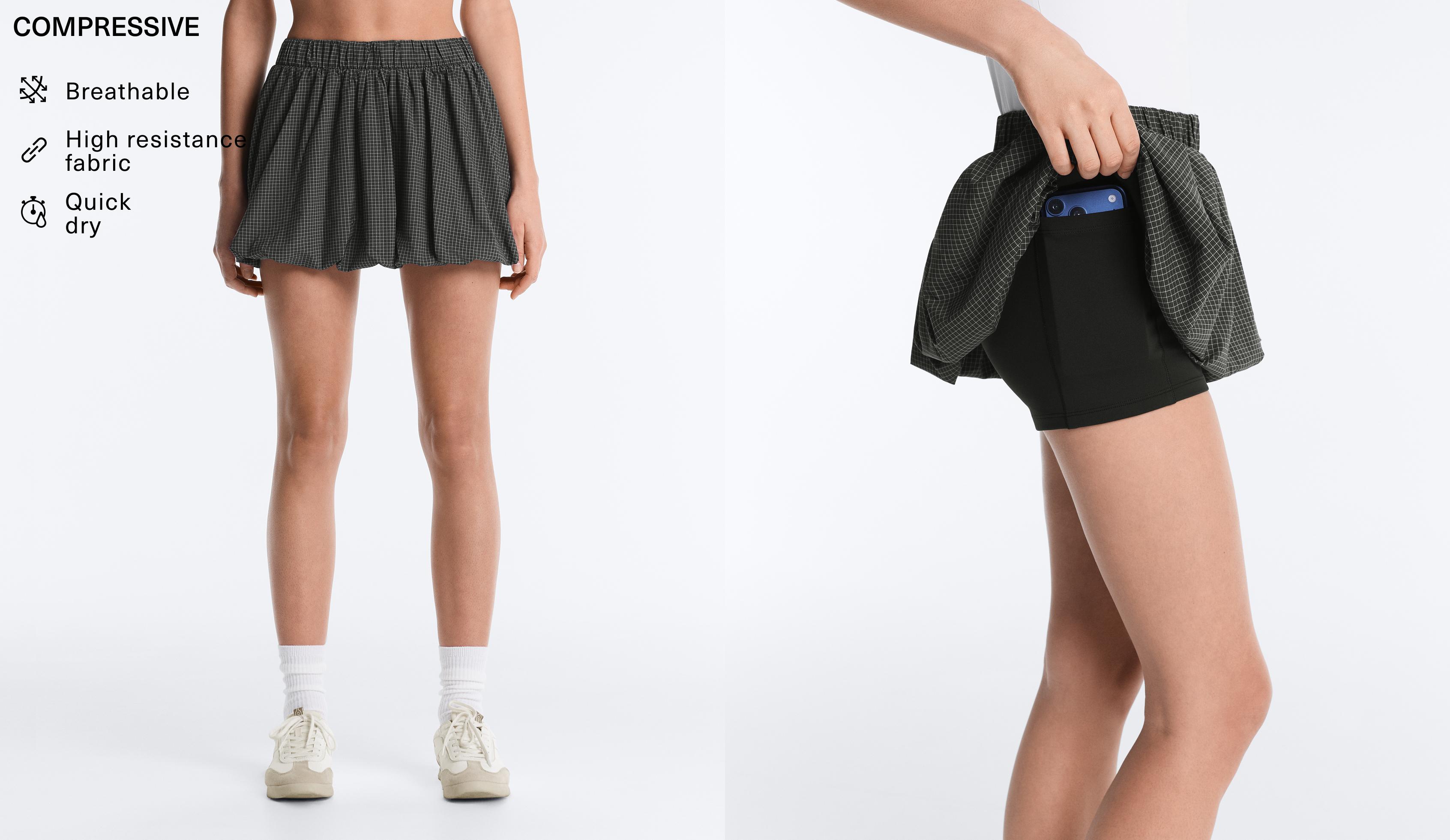 High rise Compressive check balloon mini skirt — BLACK