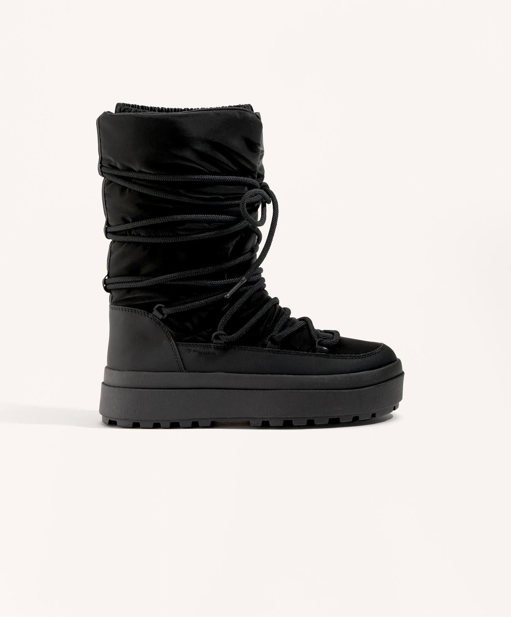 Nailoniniai aulinukai po slidinėjimo su raišteliais Nailoniniai aulinukai po slidinėjimo su raišteliais