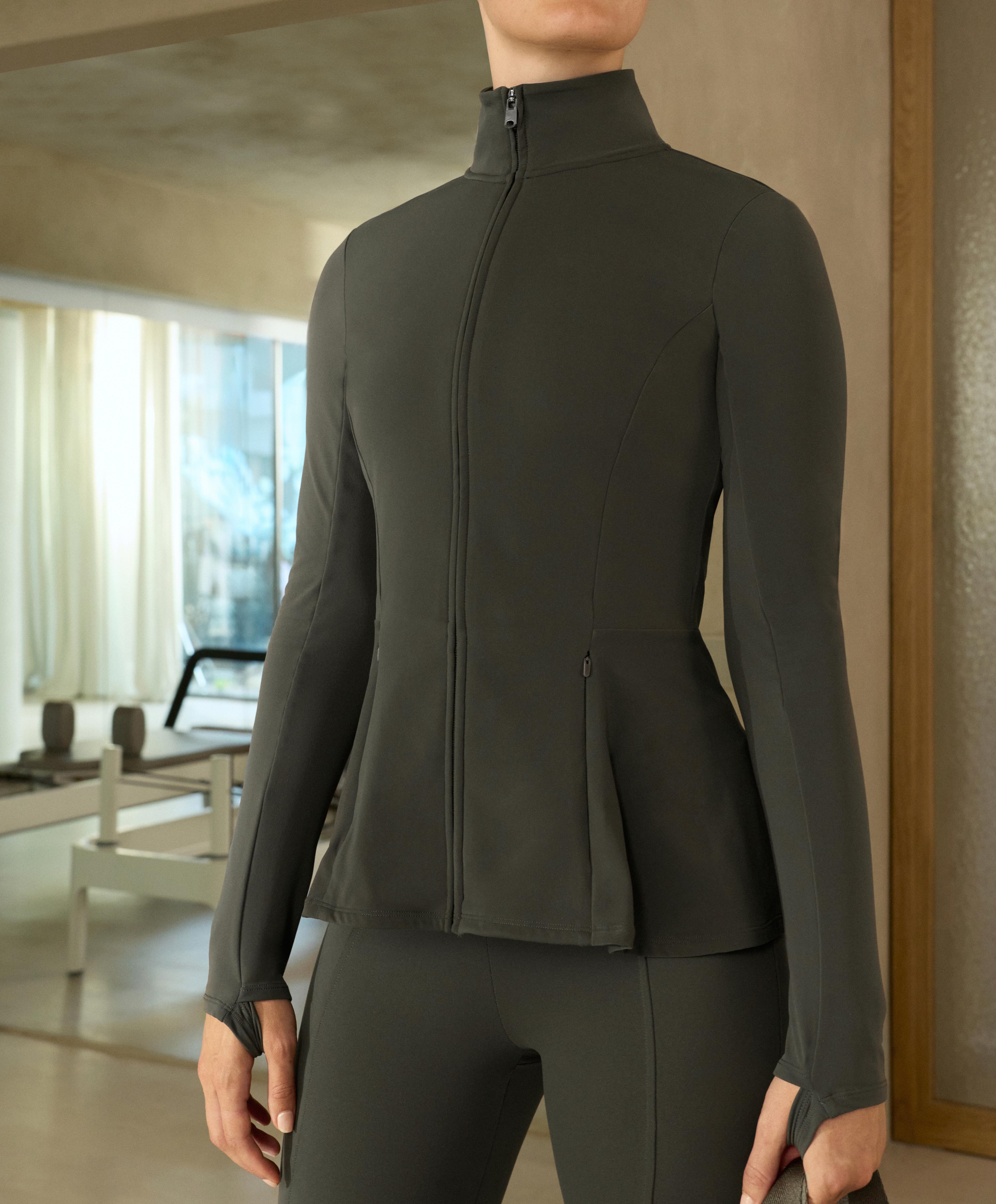 Light warm peplum technical jacket