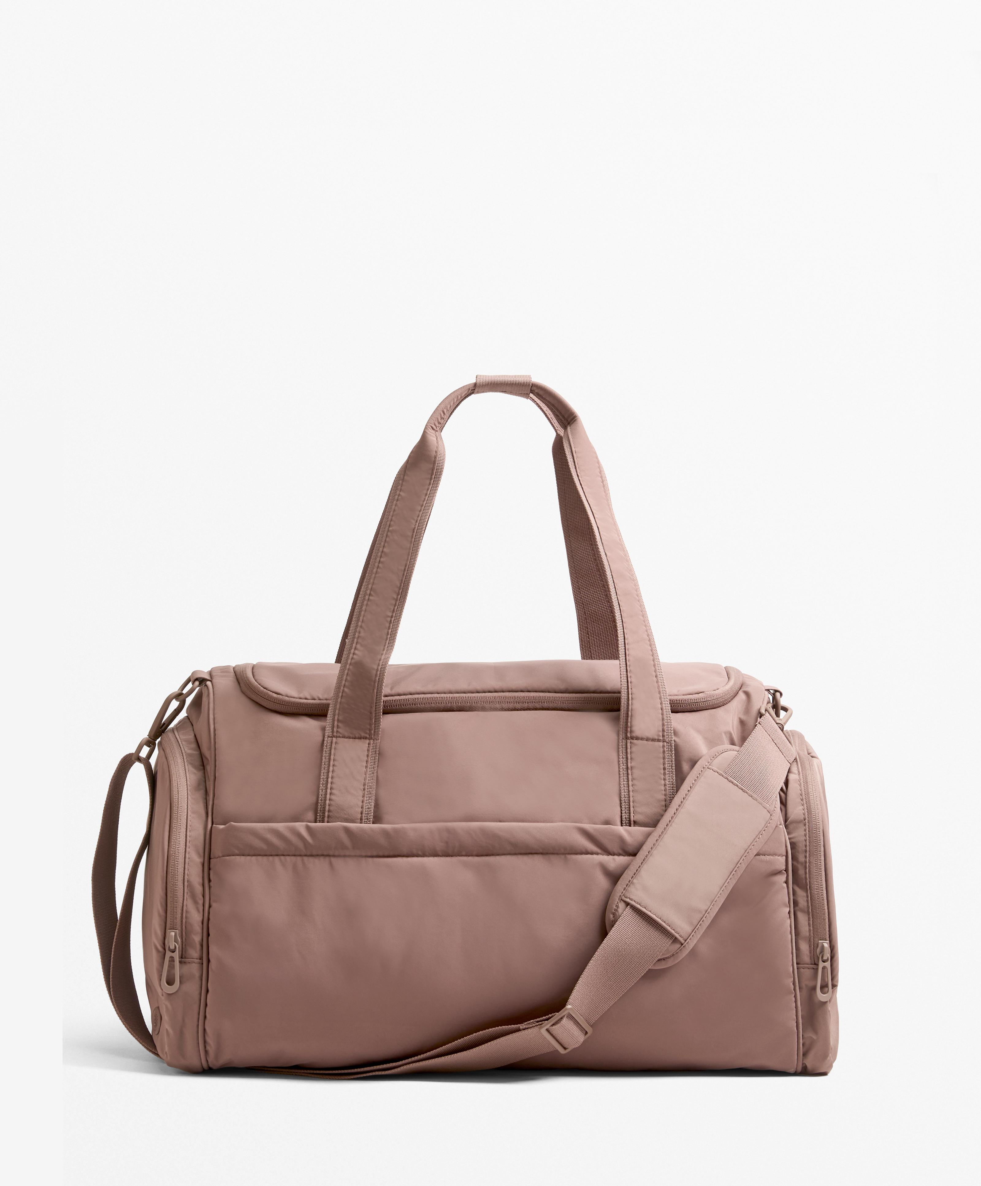 Technical bag with side pockets