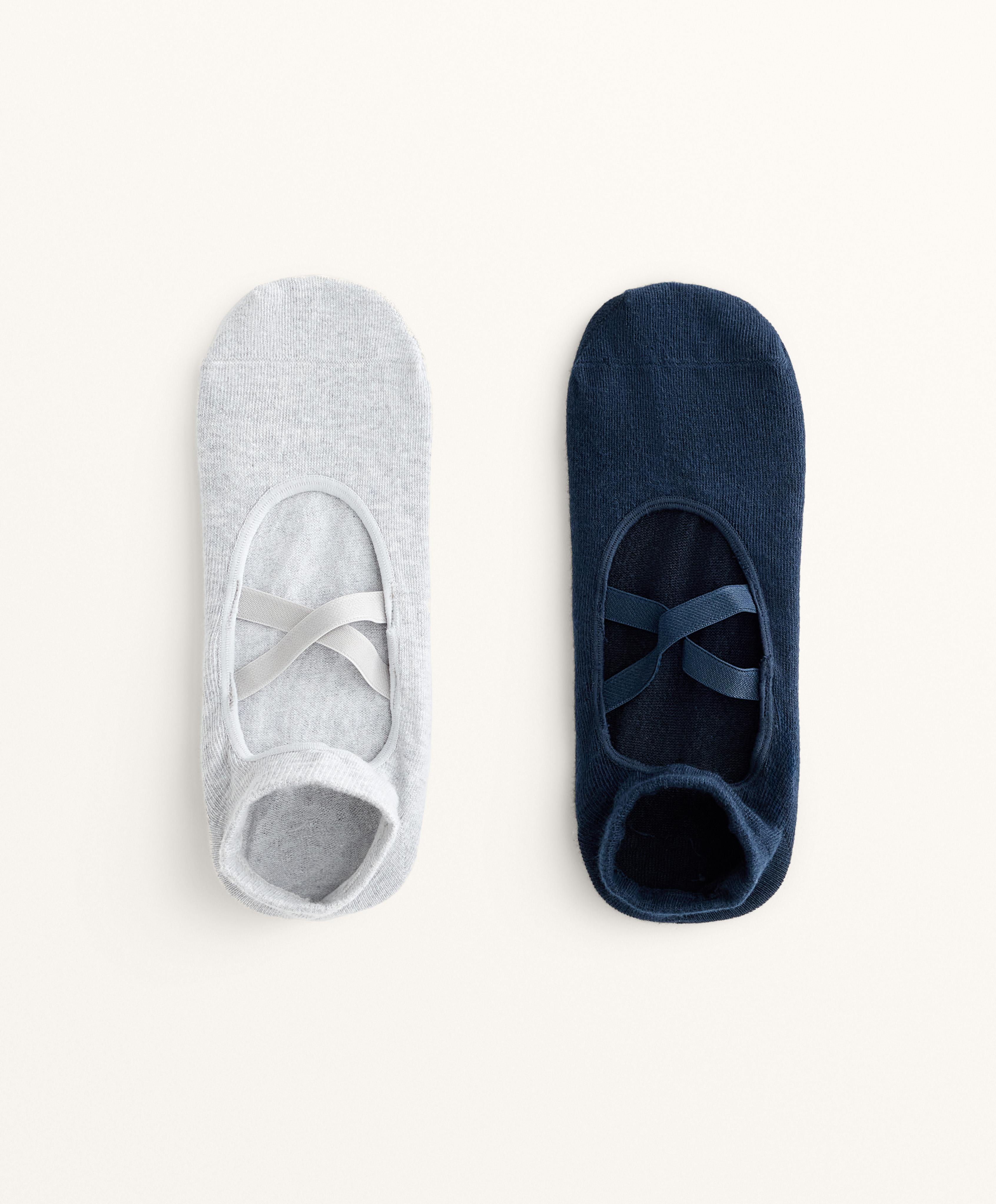 2 pairs of cotton blend yoga and Pilates socks with crossover straps