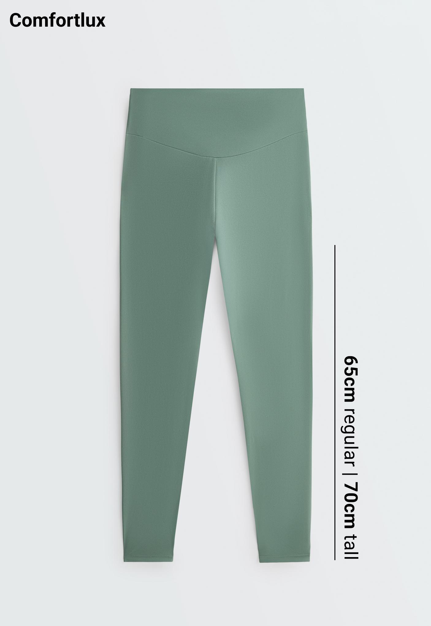 Front view of green high-waisted leggings with a V-seam on the front.