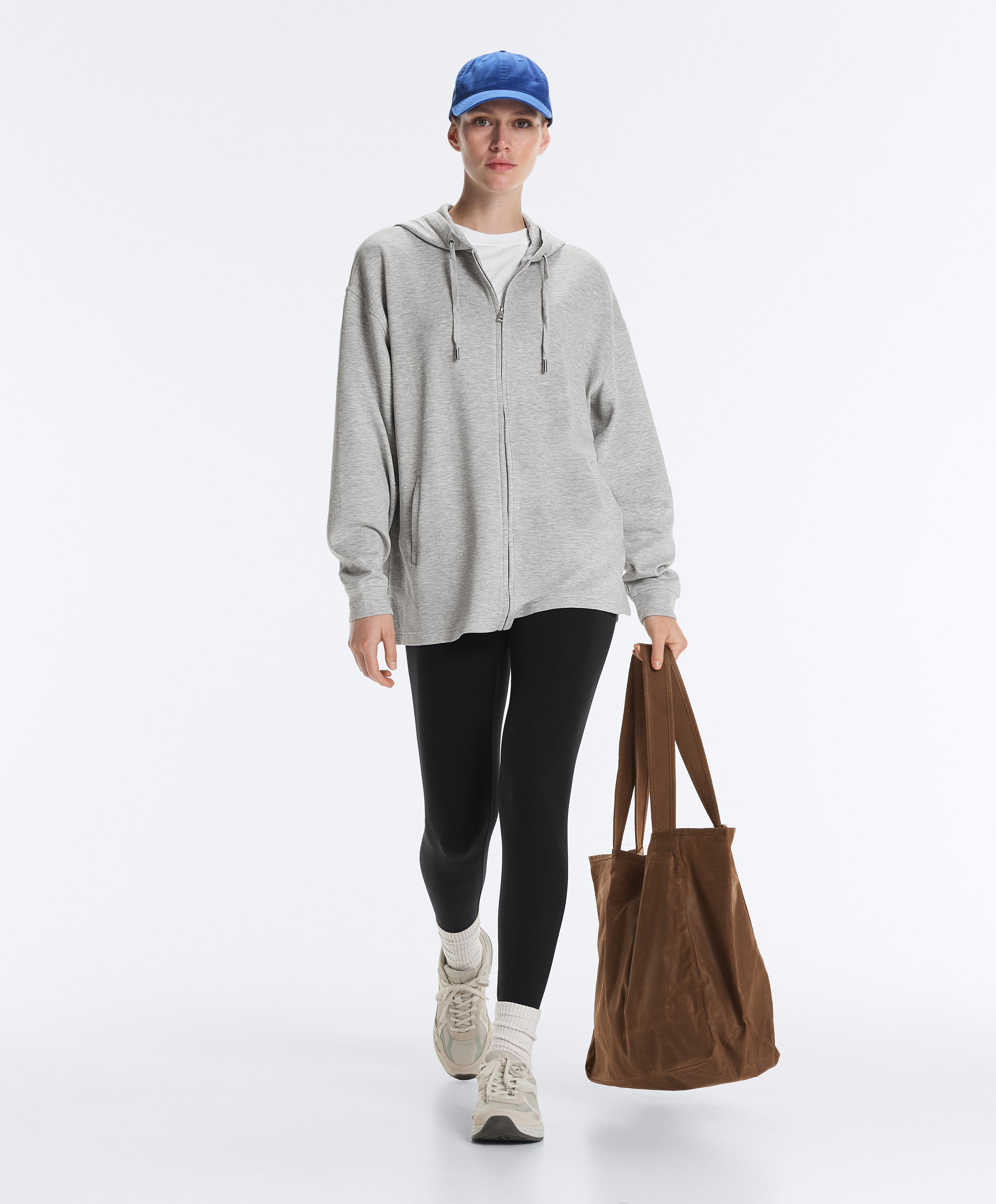 Casaco comprido com capuz em piqué mélange Casaco comprido com capuz em piqué mélange