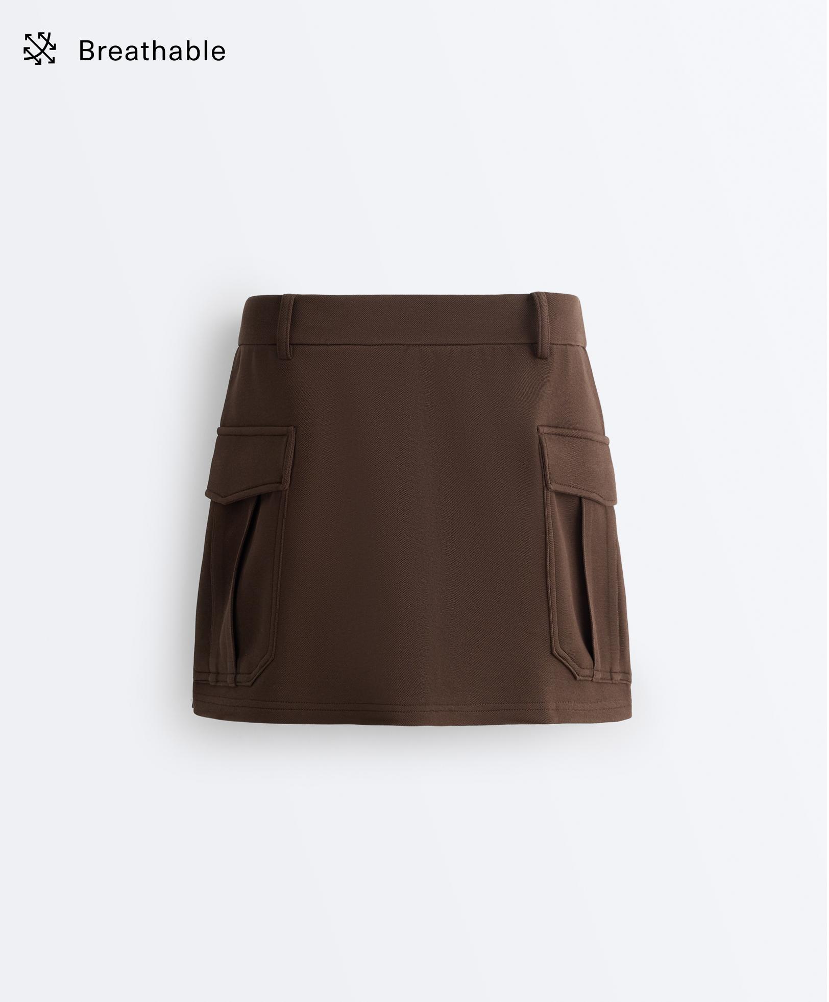 Short piqué skirt with cotton pockets Short piqué skirt with cotton pockets