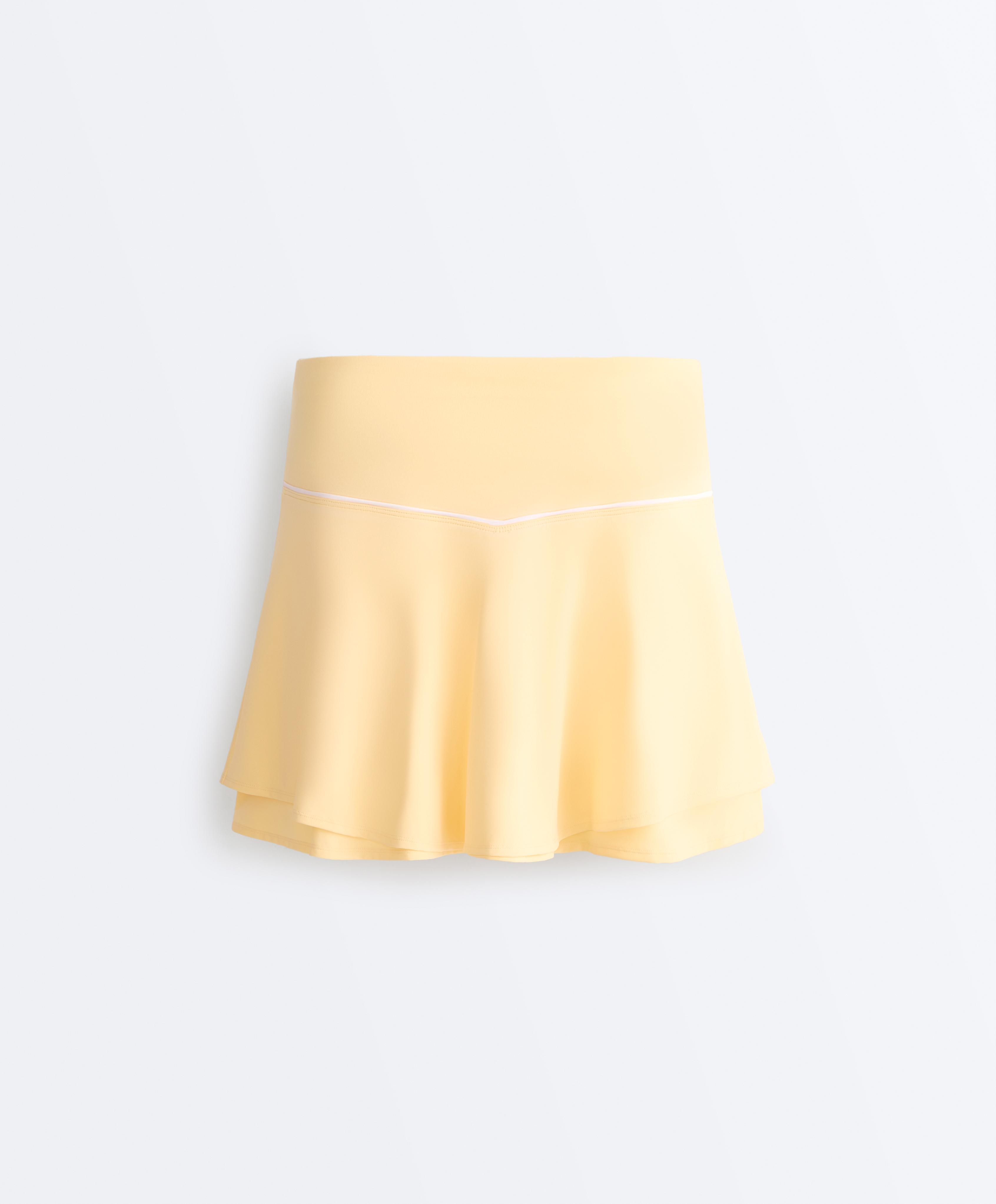 Double layer high rise short skirt — PALE YELLOW
