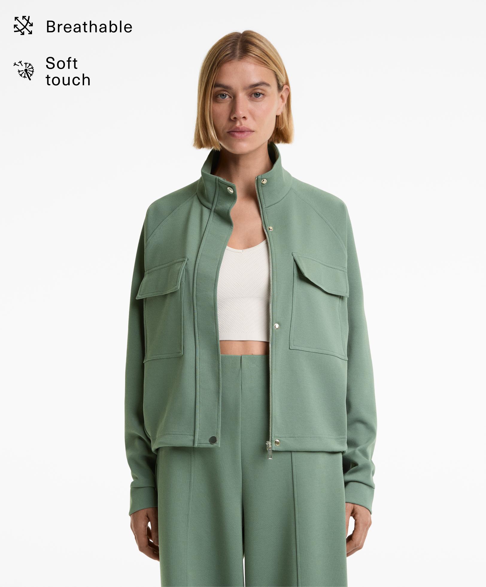 Veste en piqué à poches contenant du coton