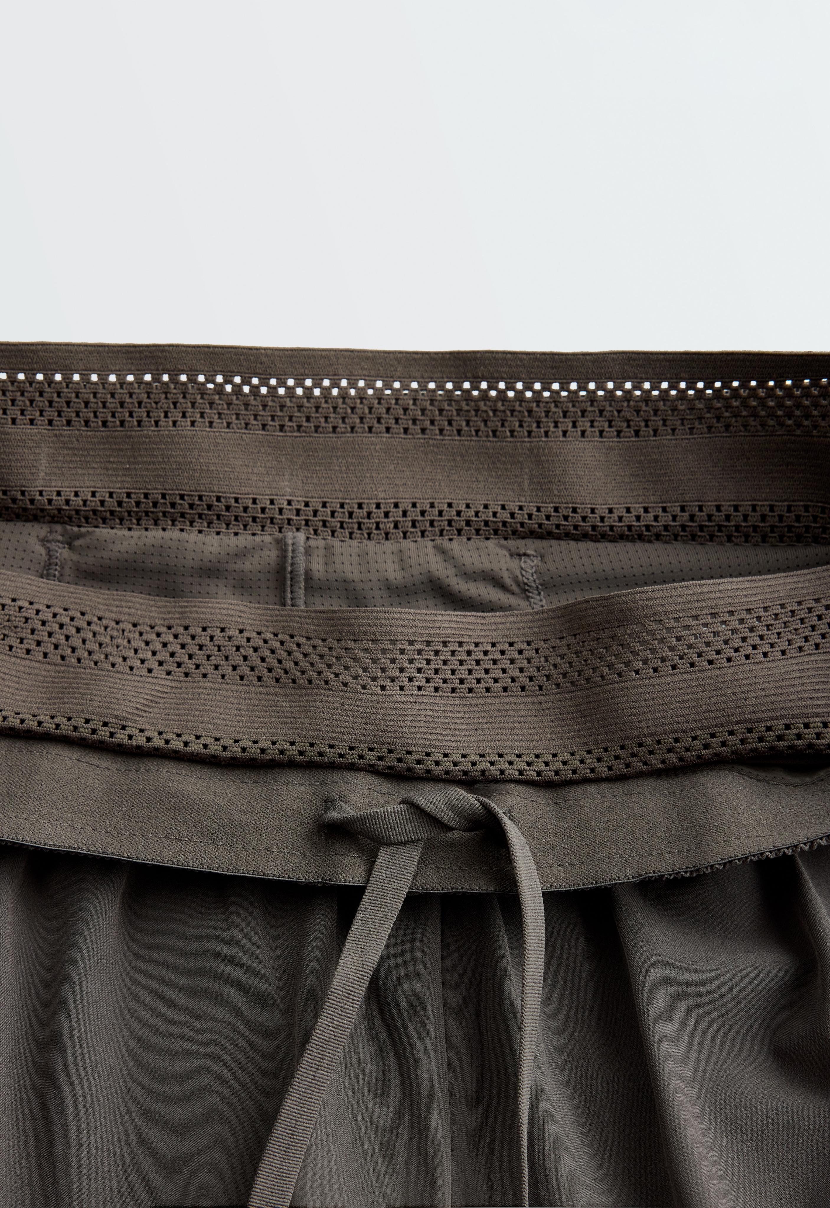 Technical mid rise 2-in-1 shorts — CHARCOAL GREY