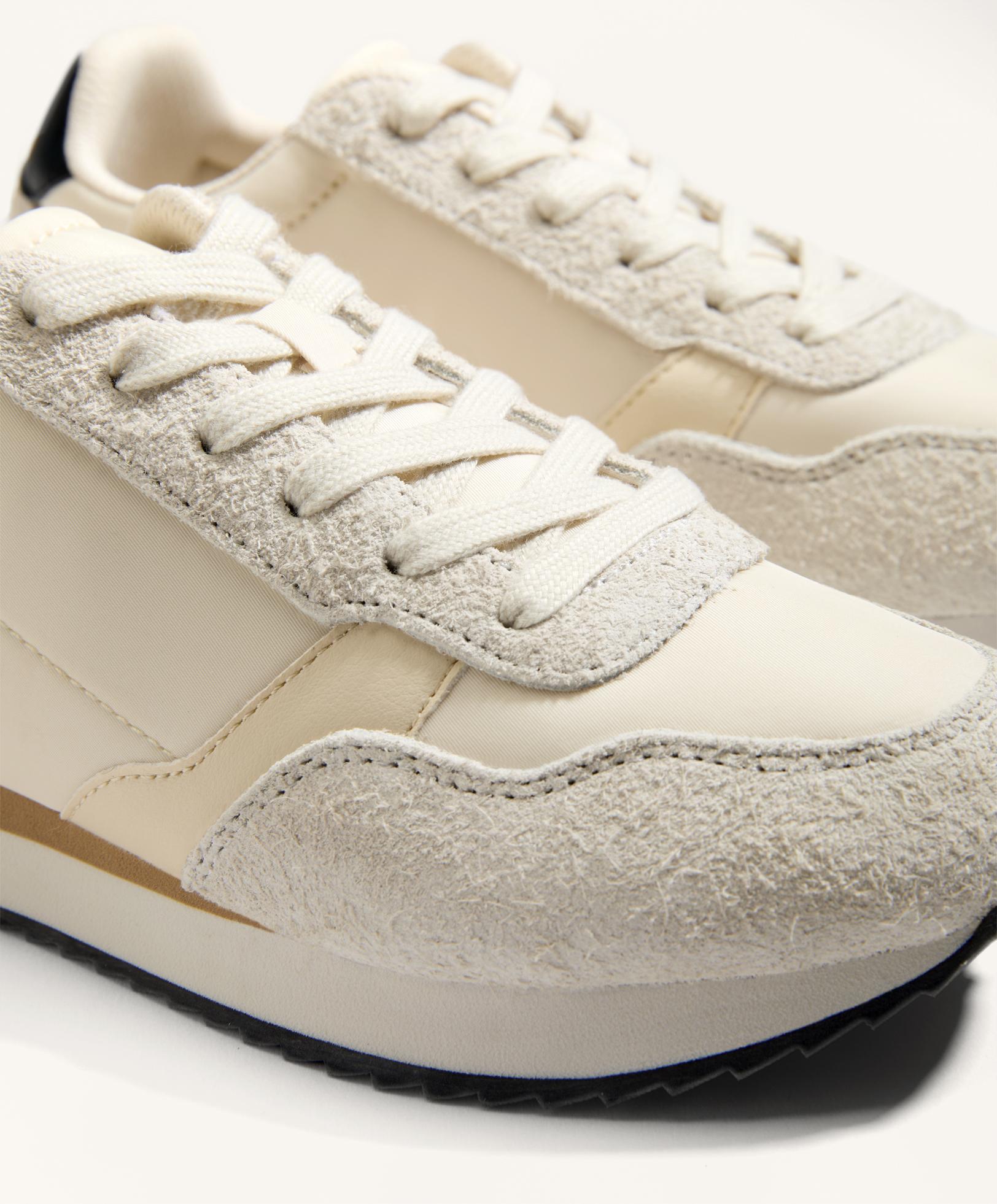 Nylon trainers with contrasting sole