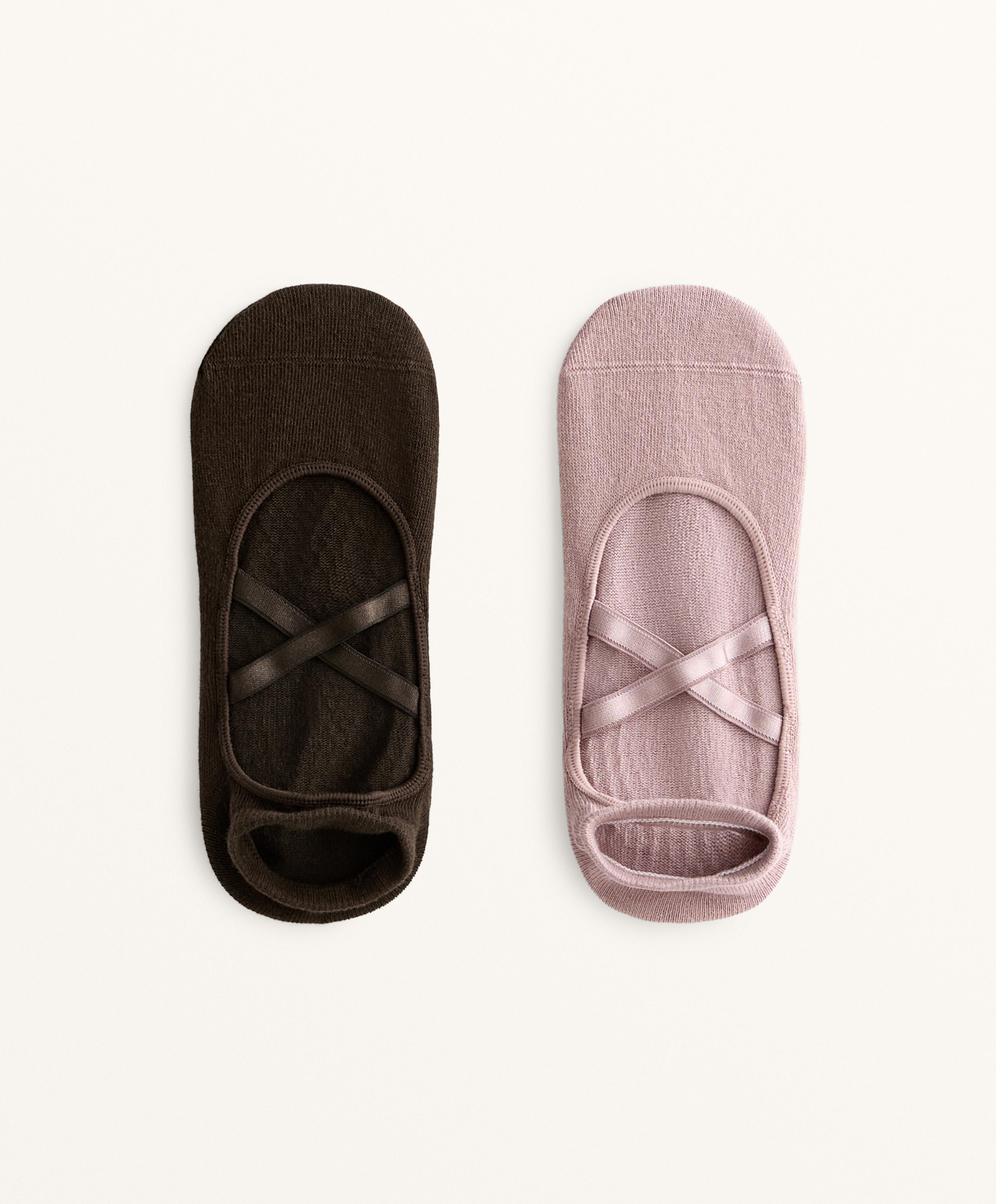 2 pairs of cotton blend yoga and Pilates socks with crossover straps