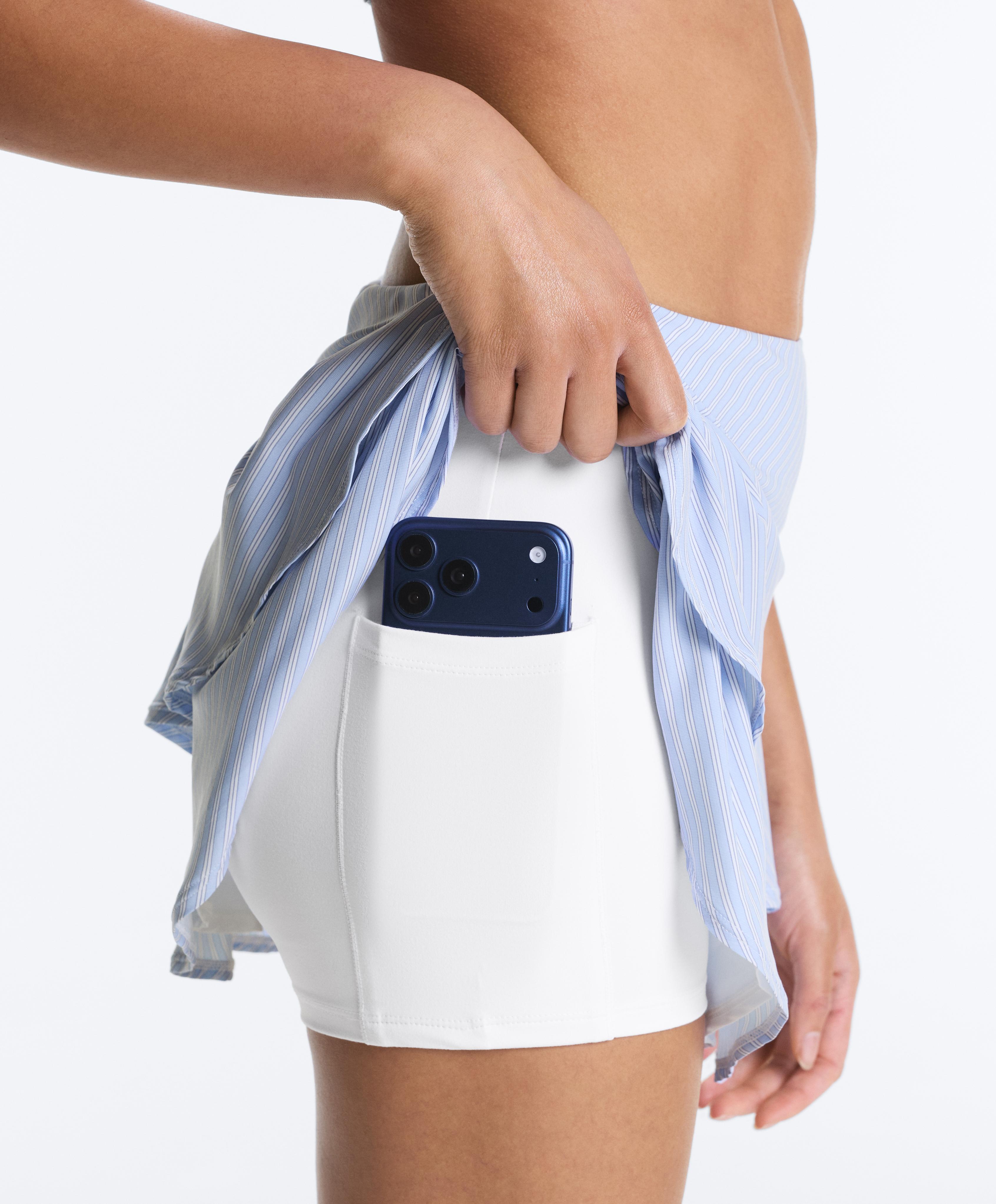 Short high rise skirt with striped ruffles — BLUE