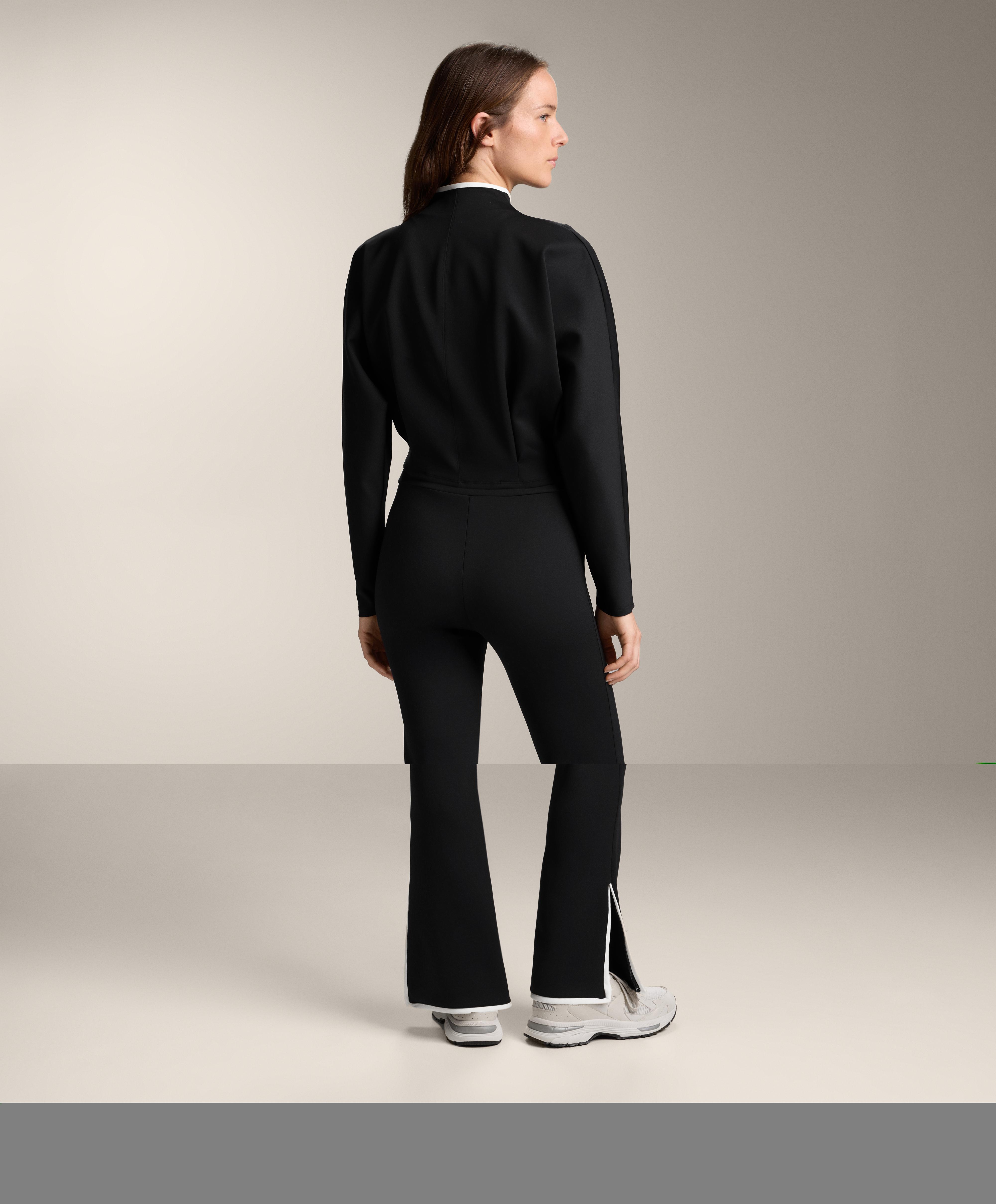 Black high-rise flare neoprene-effect contrast total look