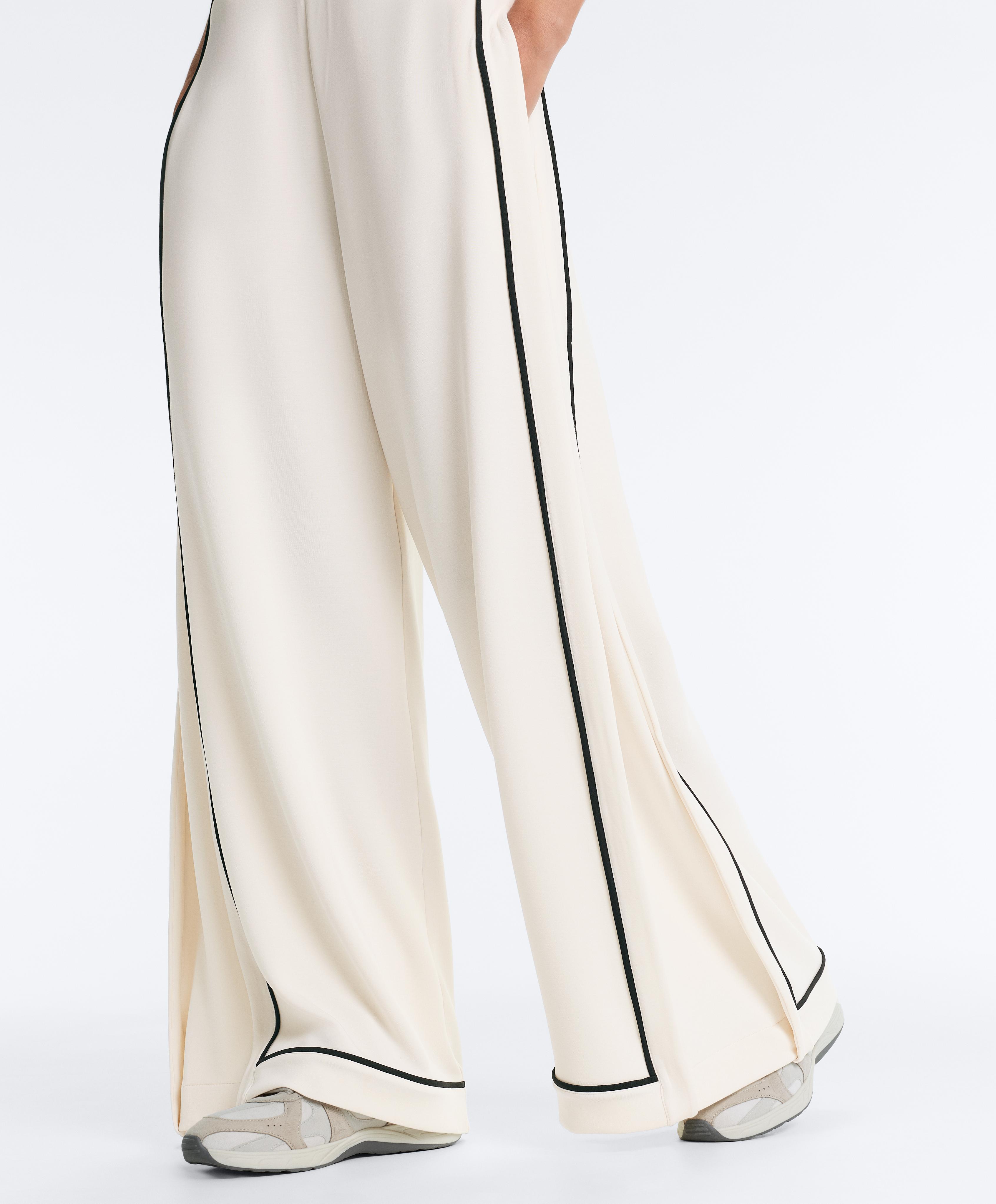 Soft-touch modal wide-leg trousers with contrast piping — PALE ECRU
