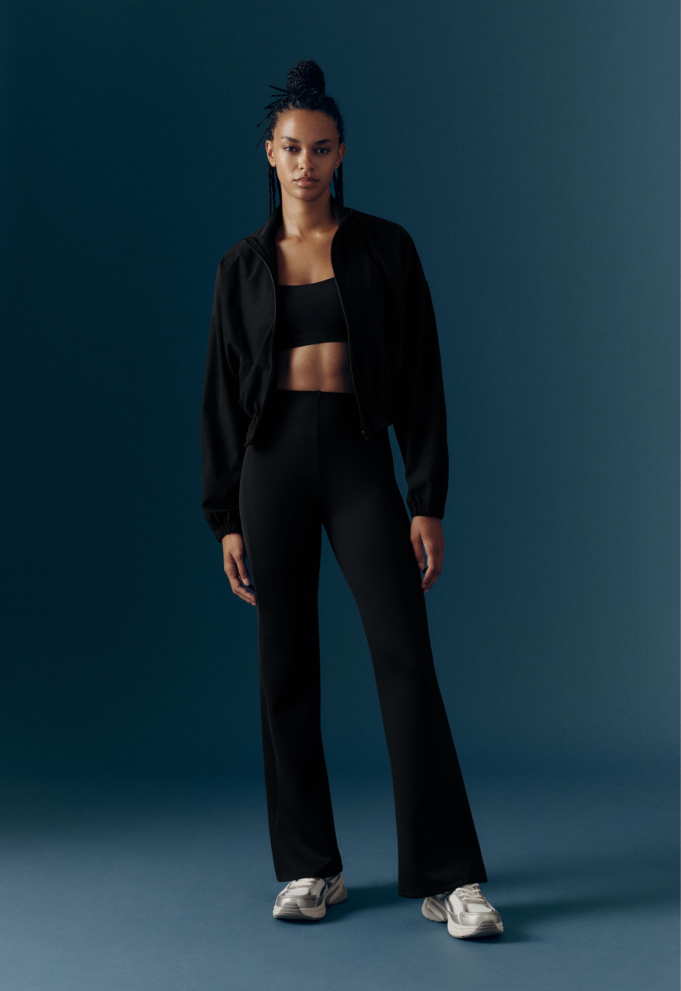 Neoprene-effect high rise flare trousers — BLACK