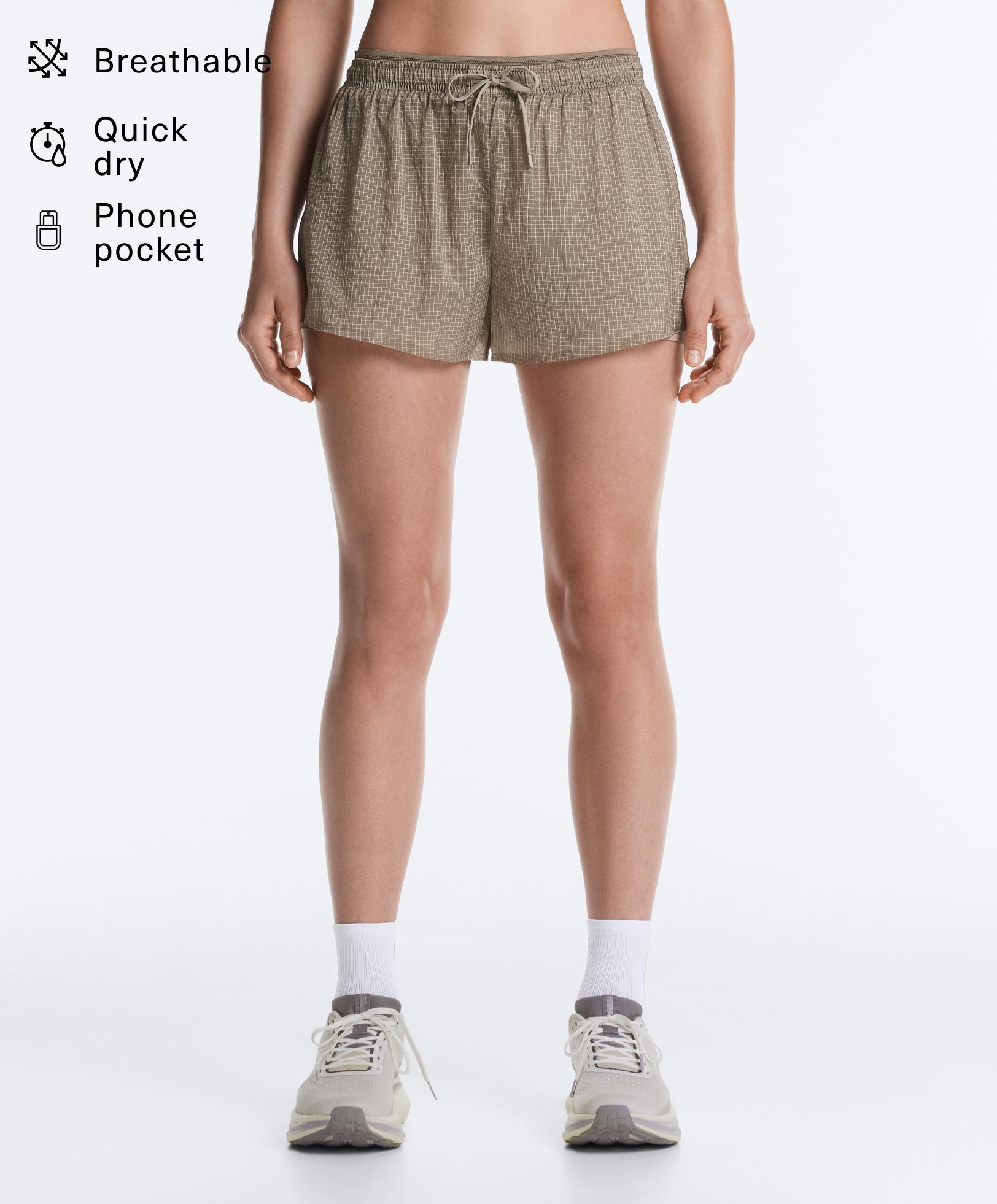 Technical mid rise 2-in-1 check shorts