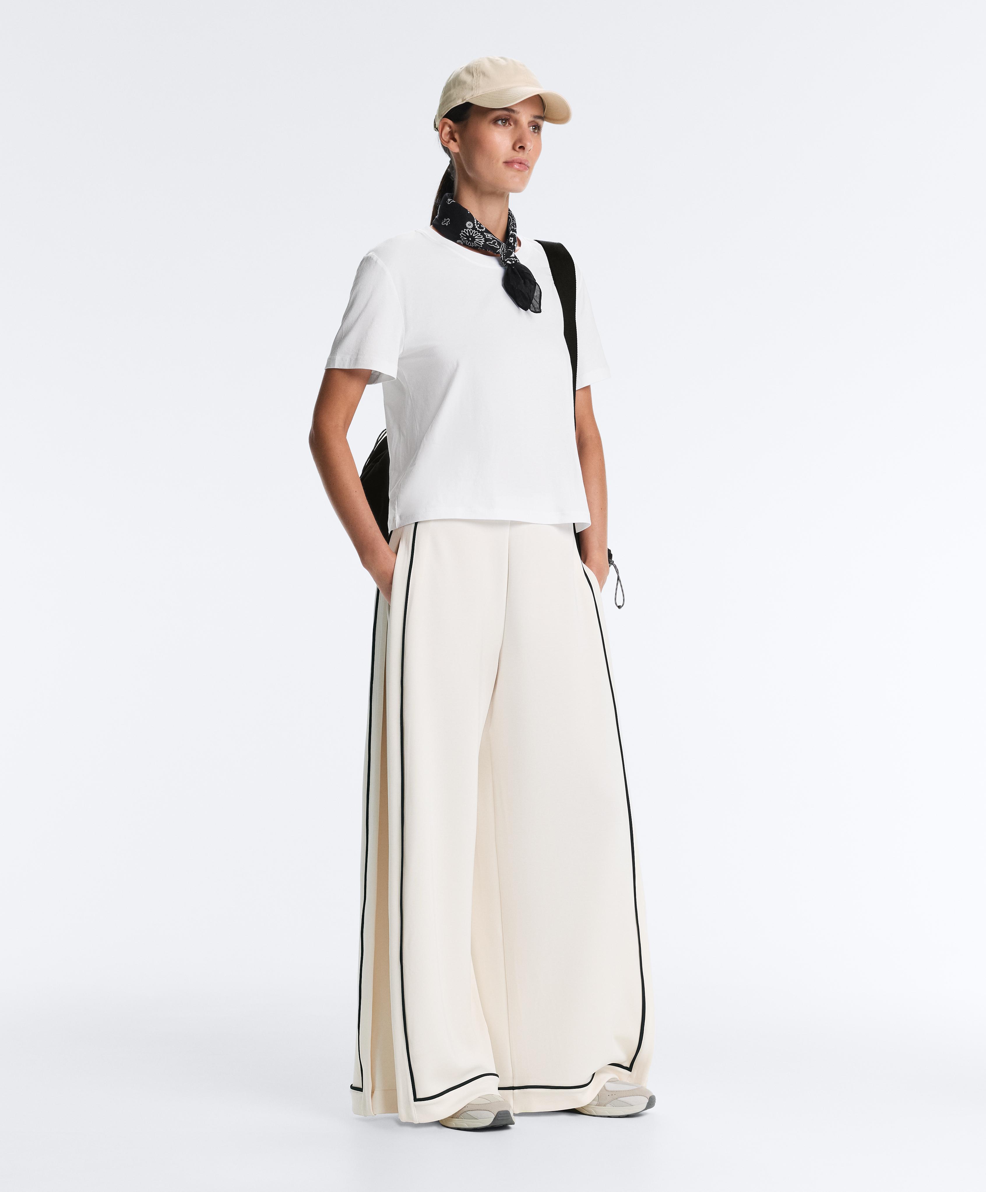 Soft-touch modal wide-leg trousers with contrast piping — PALE ECRU