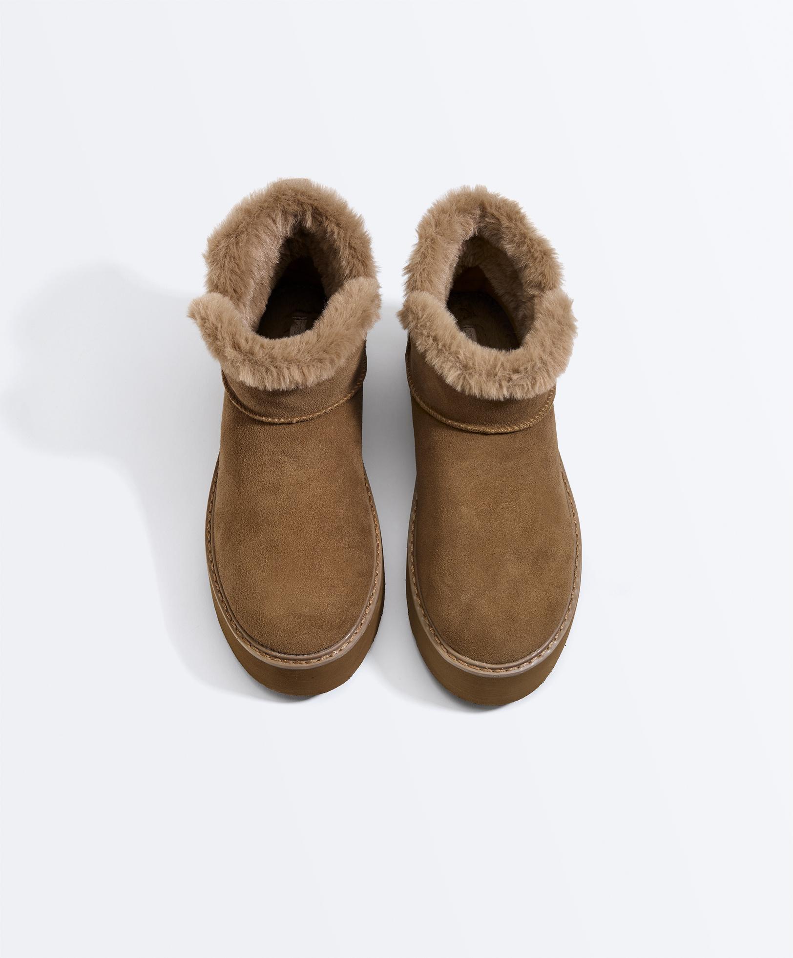 Bottes en cuir à semelle compensée