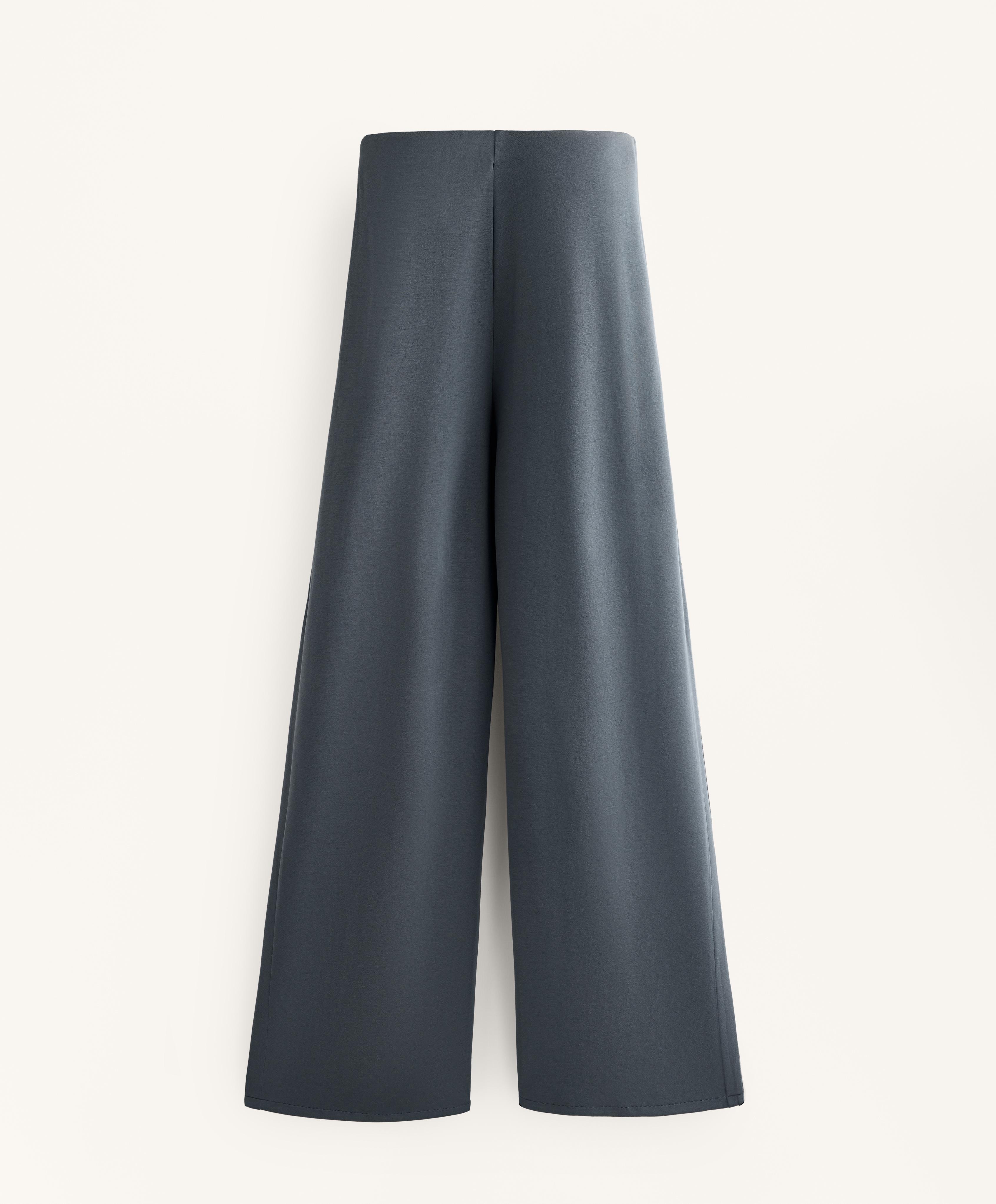 Wide leg side-pleated trousers with soft-touch modal.
