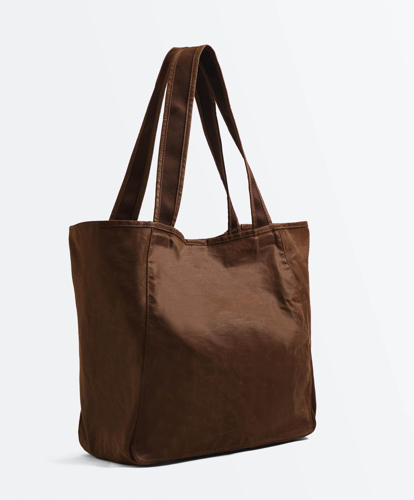 حقيبة تسوق شمعية - تنزيلات