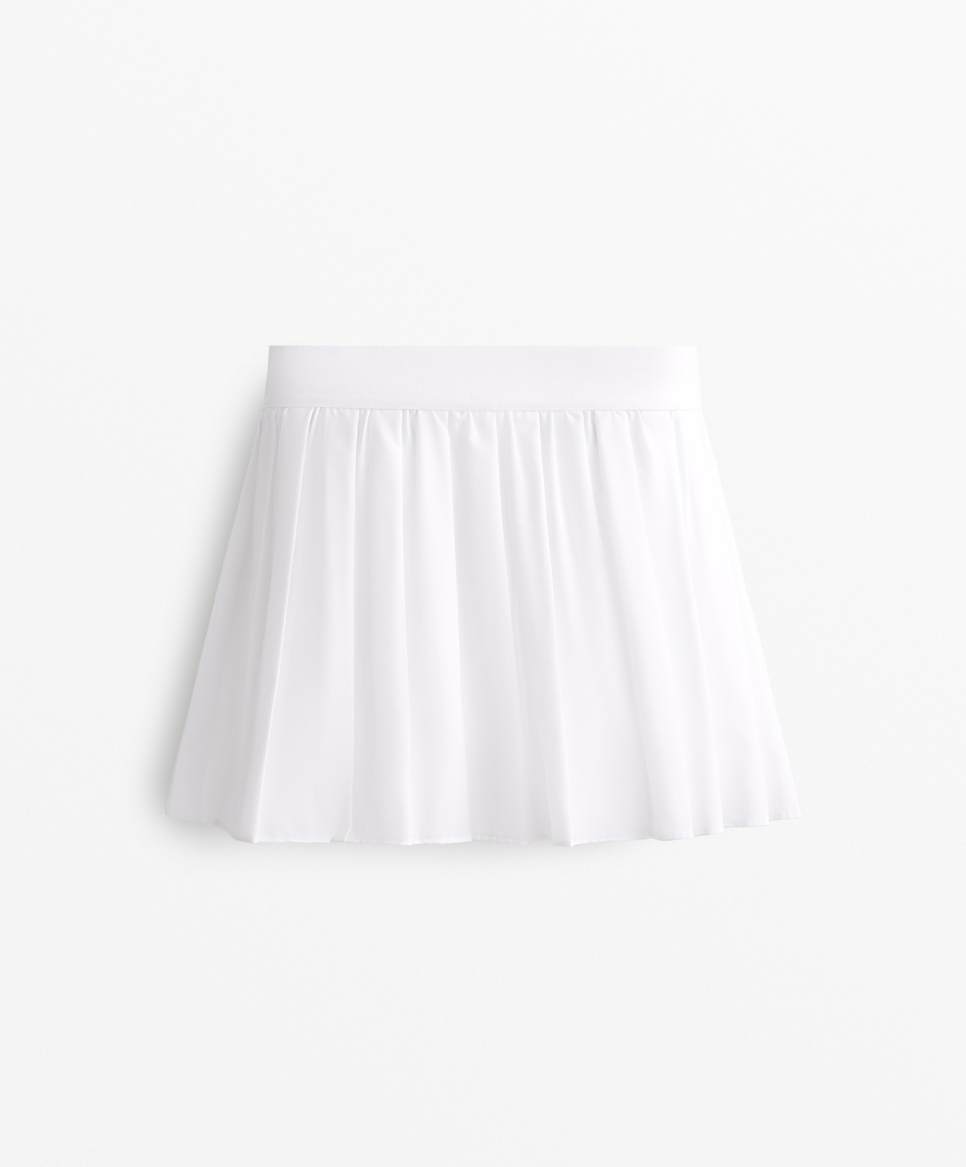 Pleated compressive skirt