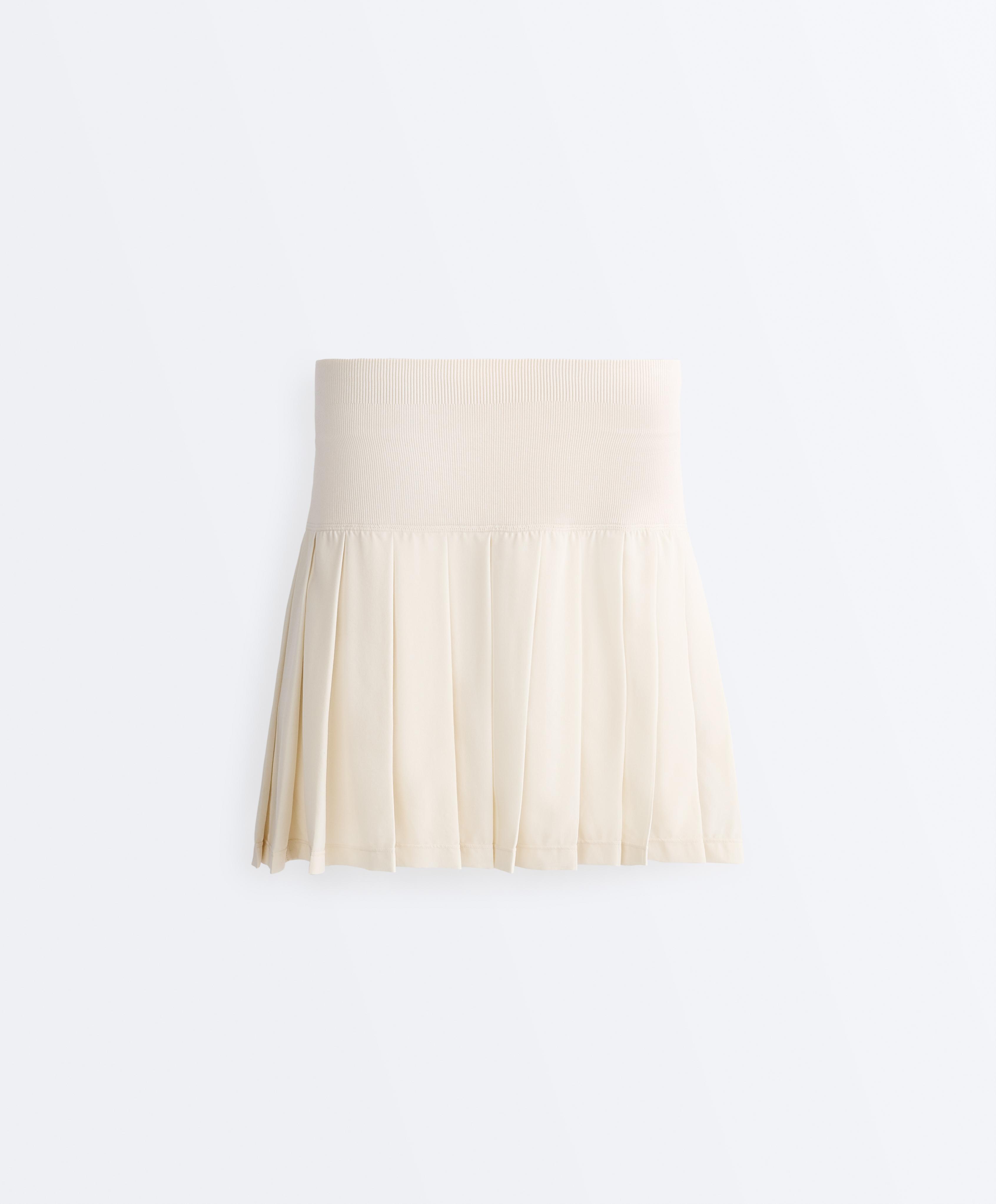 Pleated high-rise seamless short skirt — PALE ECRU