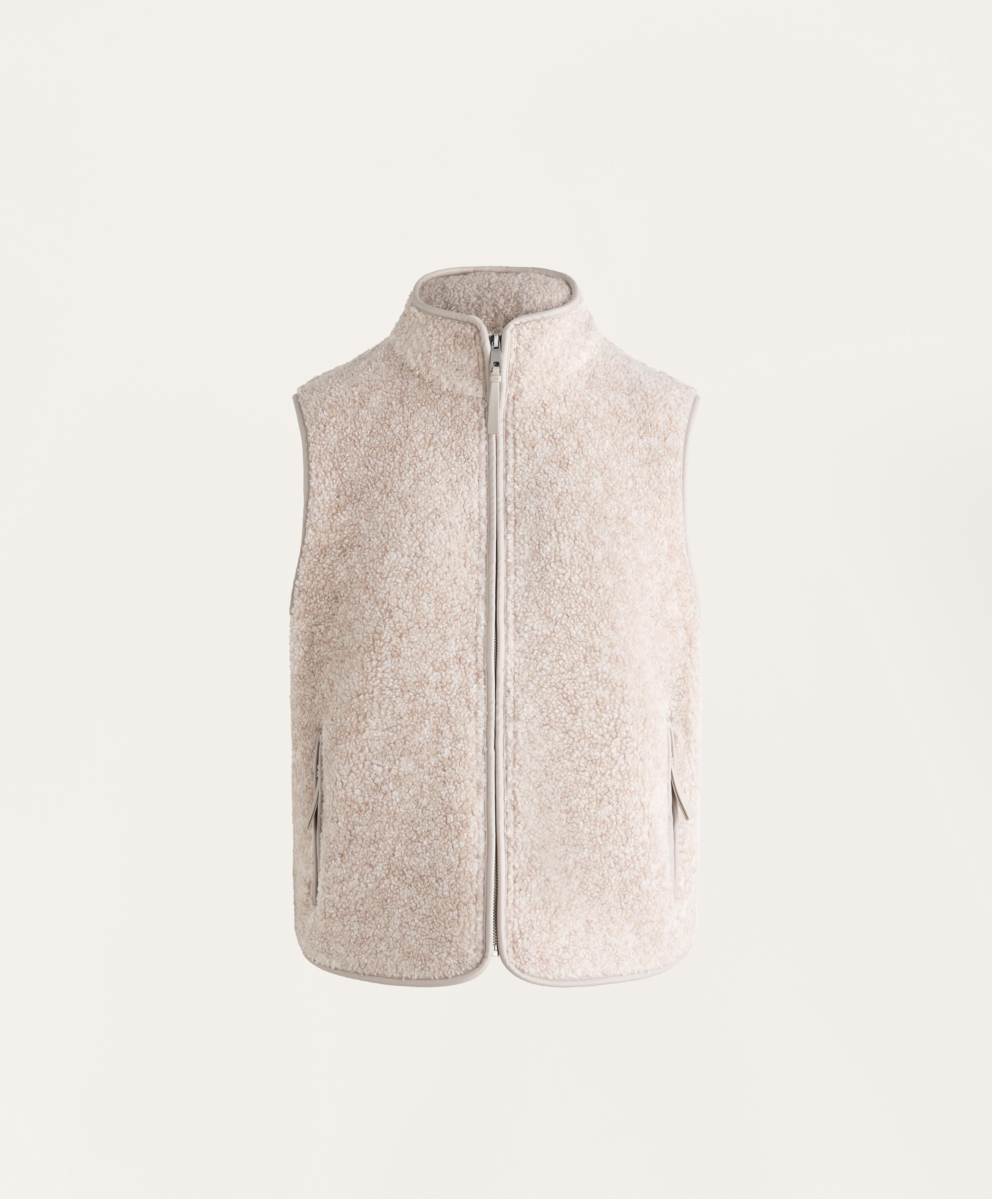 Основен елек од вештачко јагнешко крзно со патент. - Намалениe