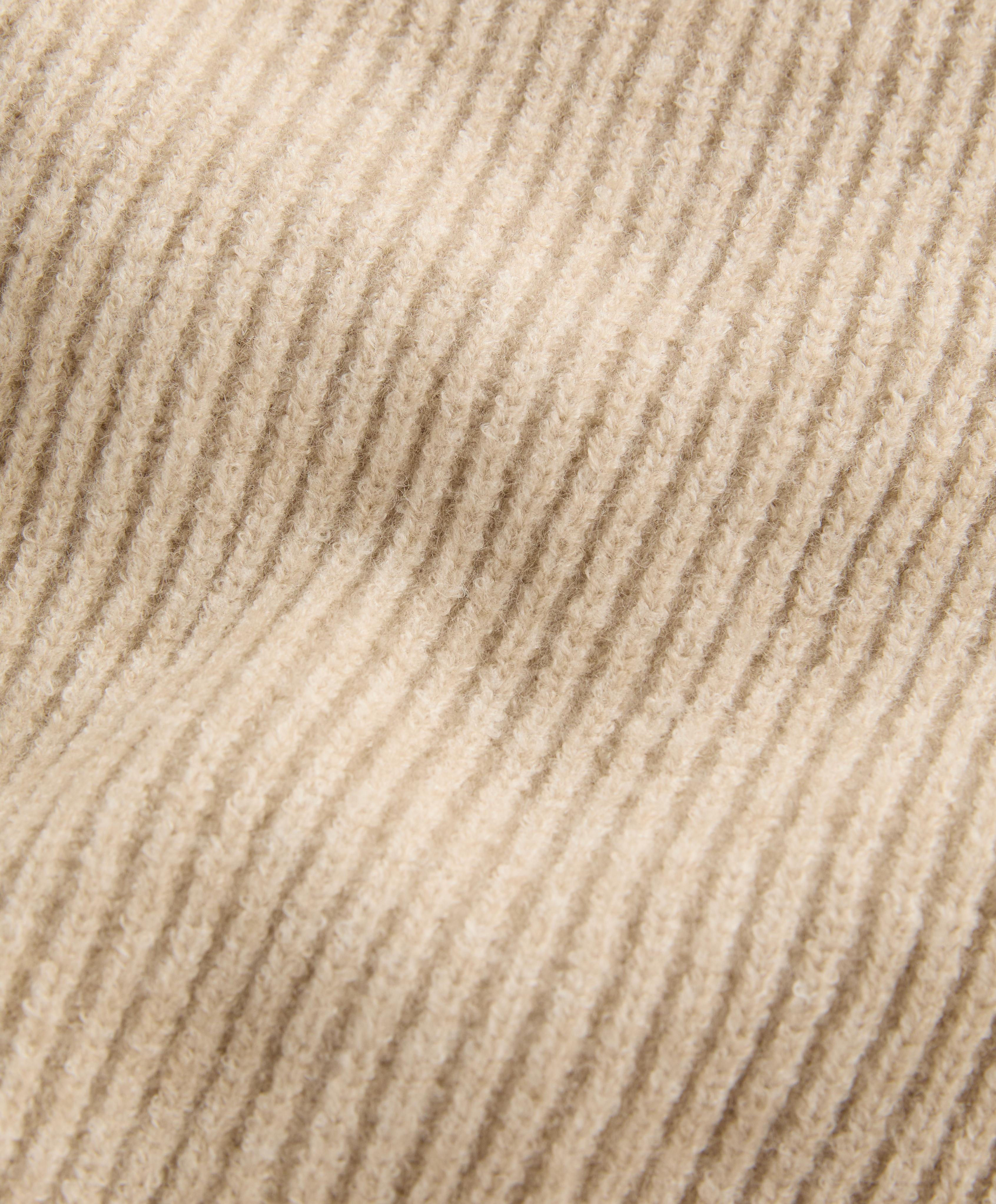 Casaco crop de gola subida em malha rib