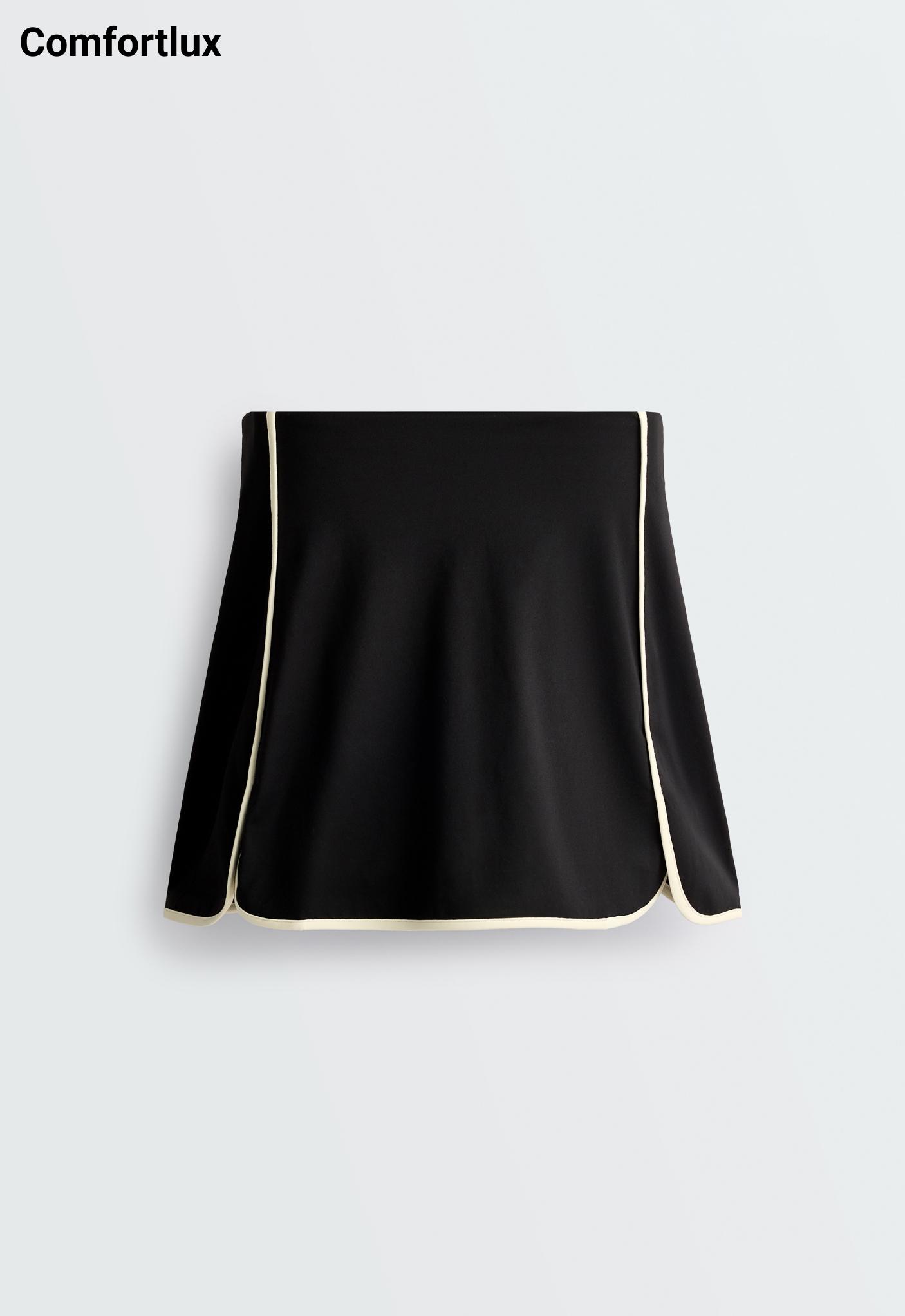 Comfortlux short skirt with contrast piping — BLACK