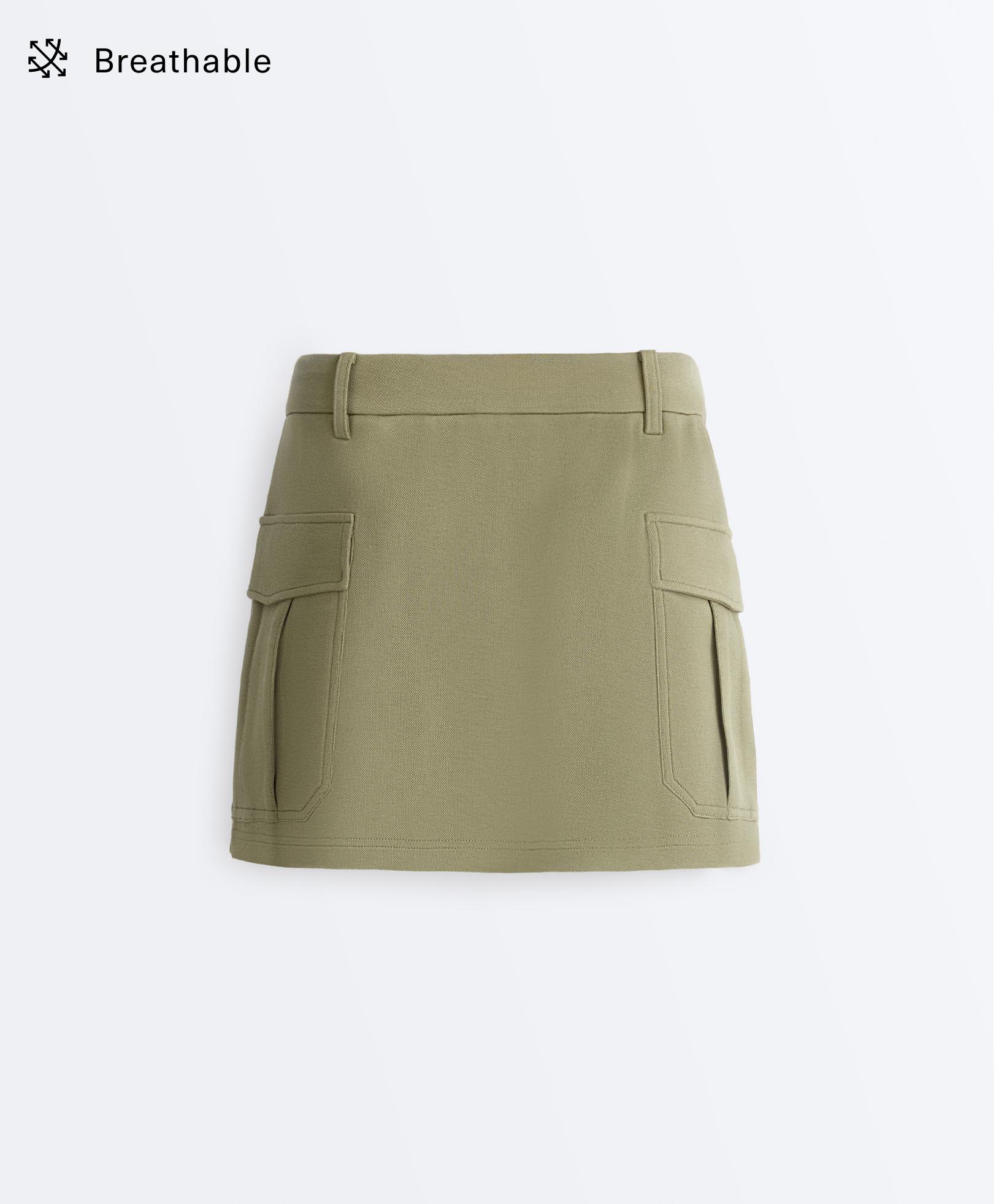 Short piqué skirt with cotton pockets Short piqué skirt with cotton pockets