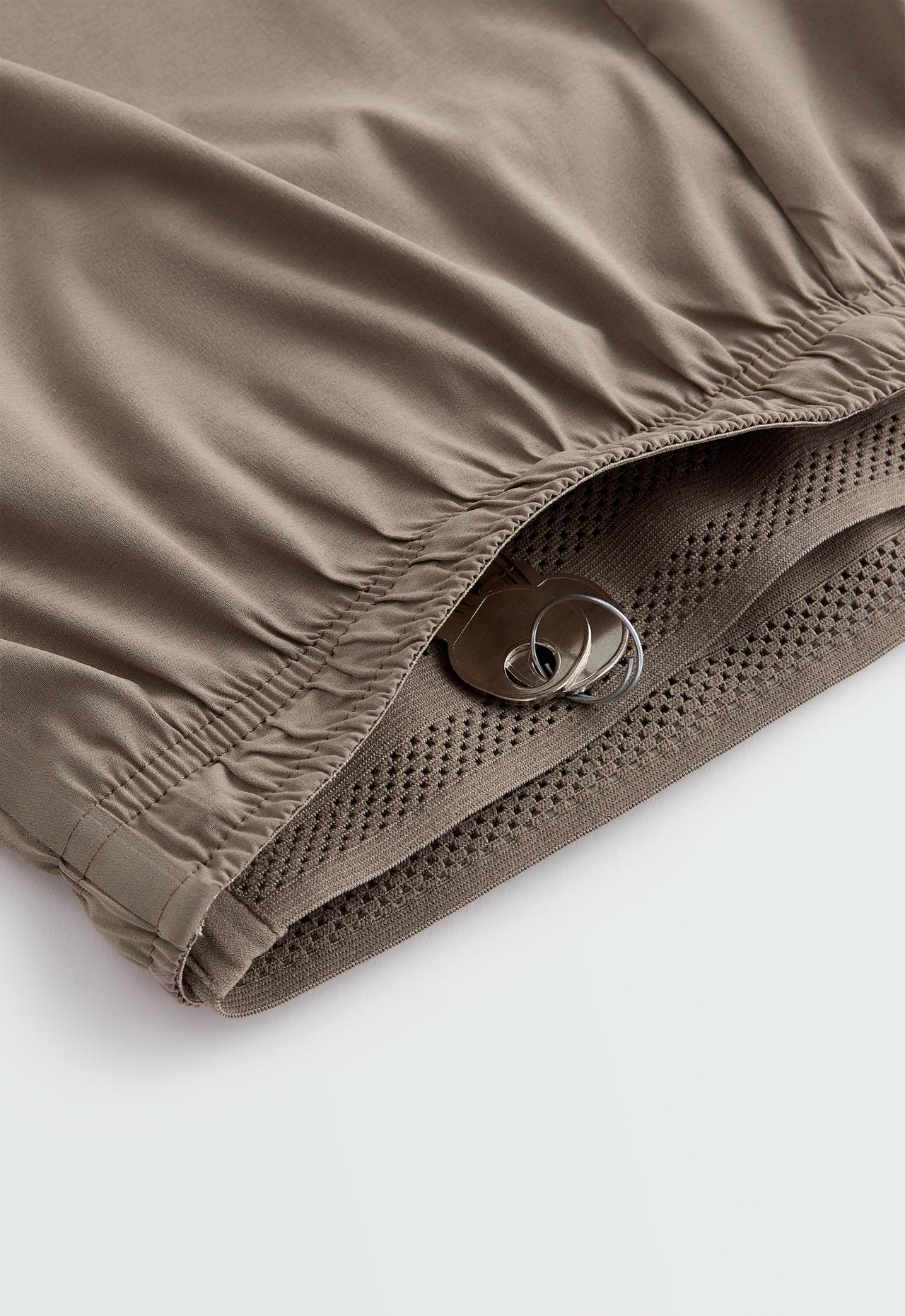 Technical mid rise 2-in-1 shorts — DARK MINK
