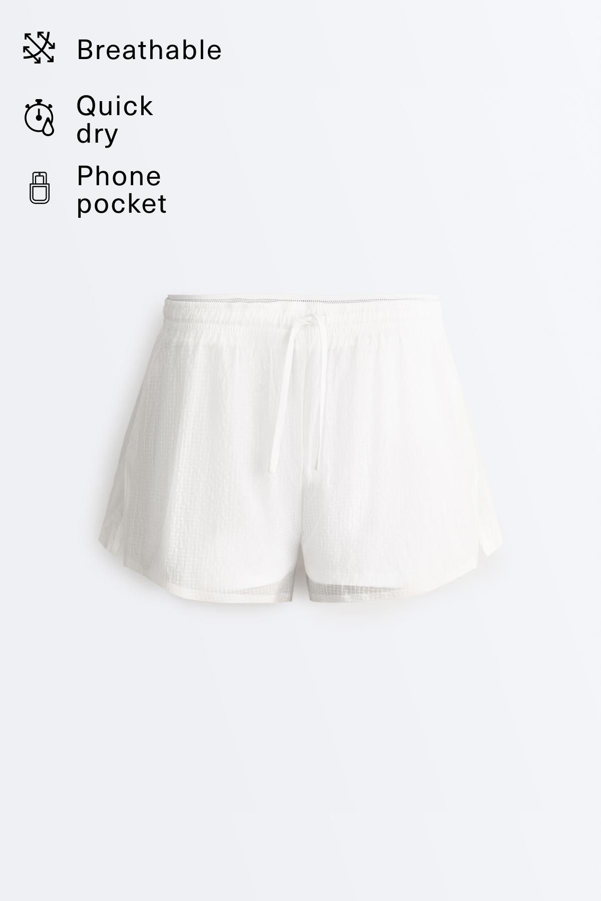 Technical 2-in-1 checked mid-rise shorts — WHITE