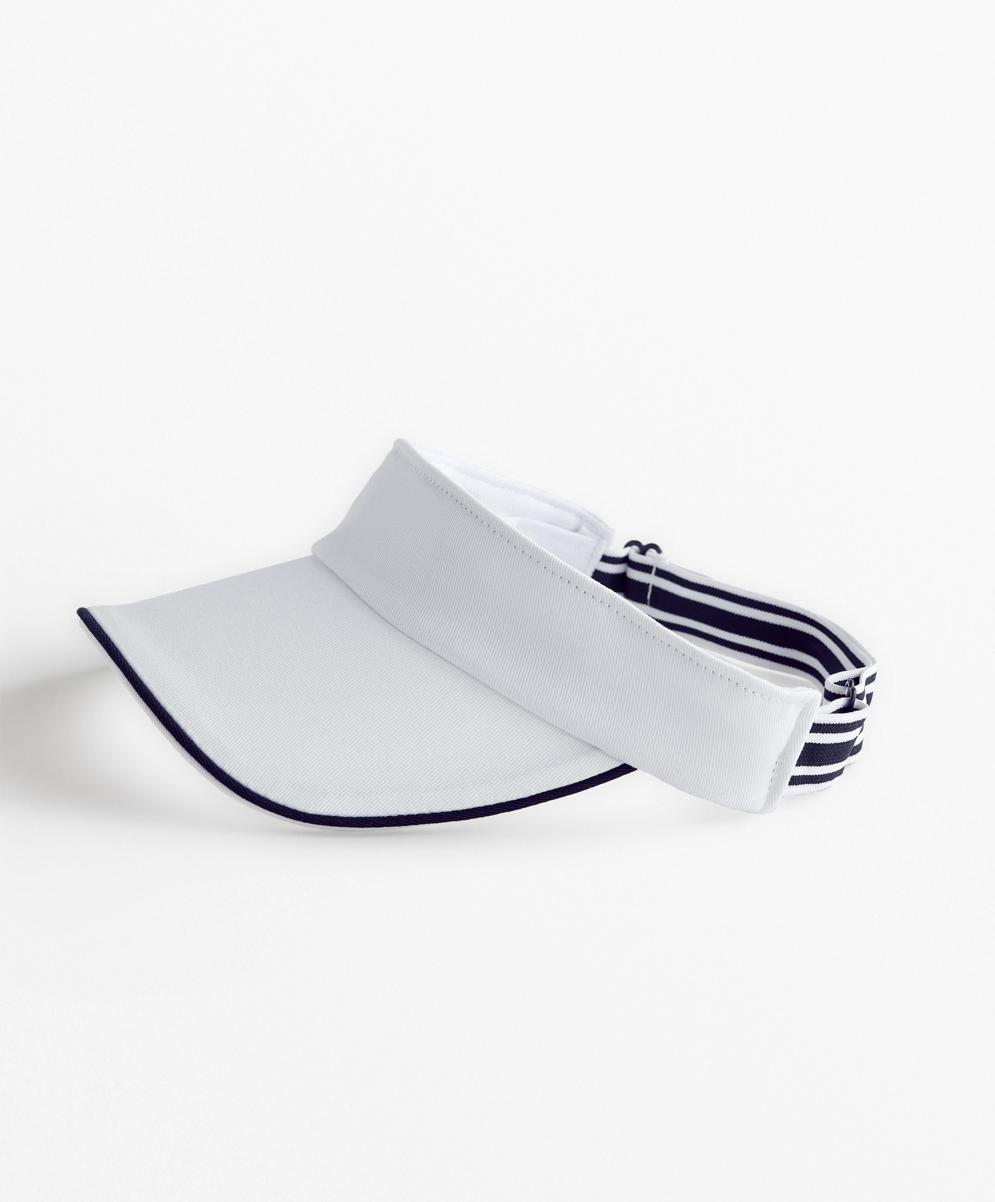 Sports visor with piping