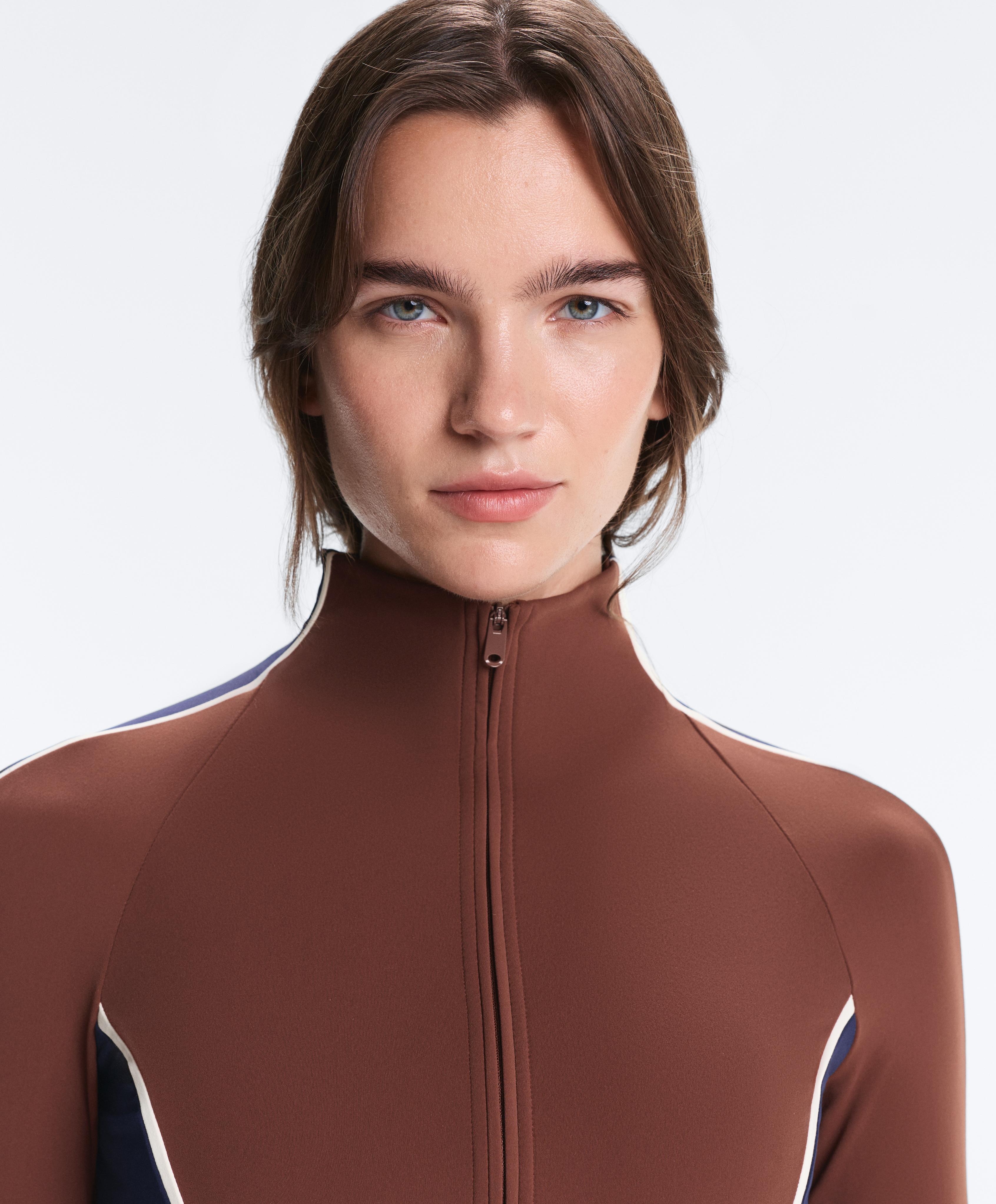 Light warm colour-block technical jacket — TERRACOTTA